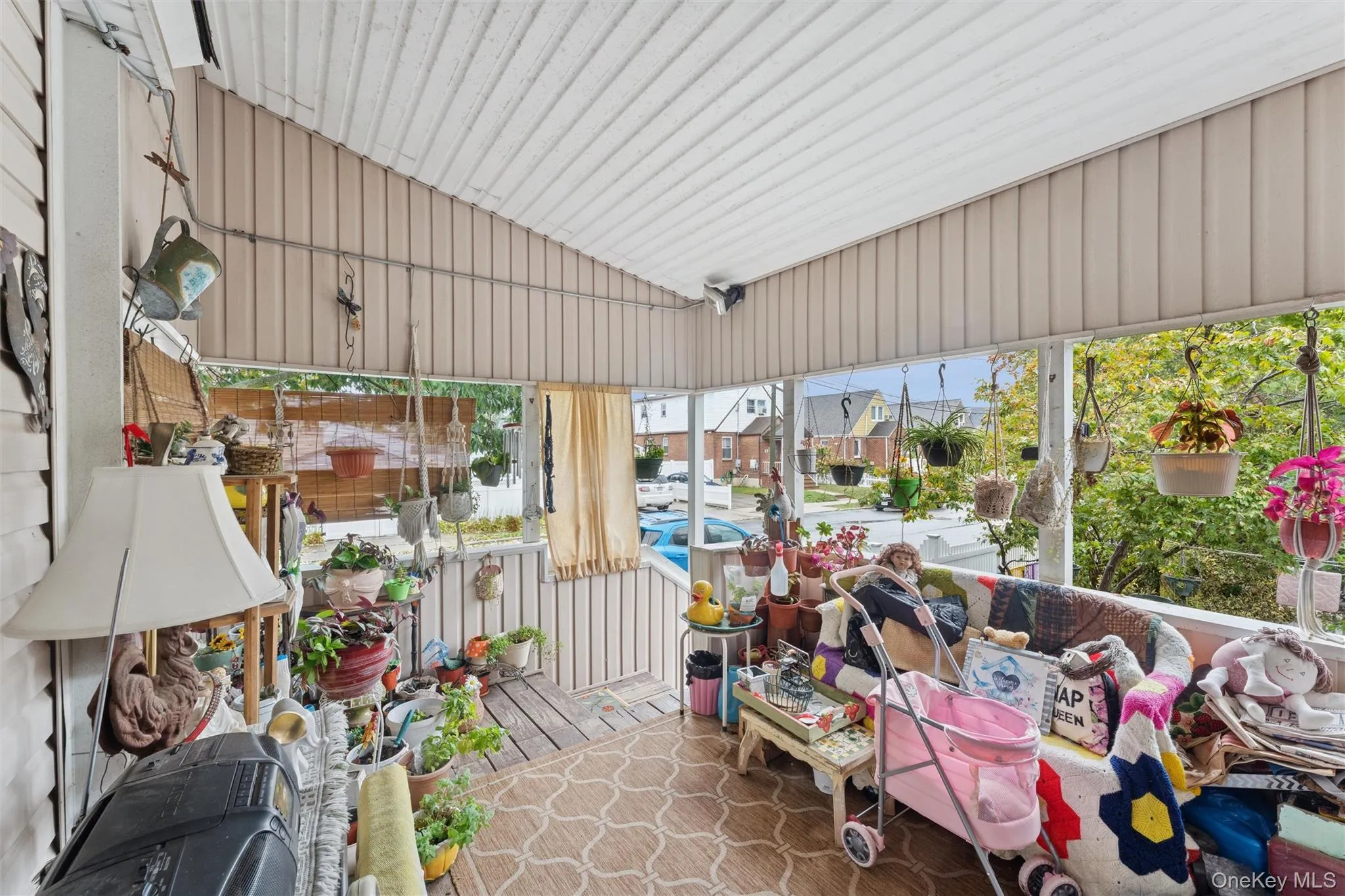 Sunroom with a residential view Sunroom with a residential view