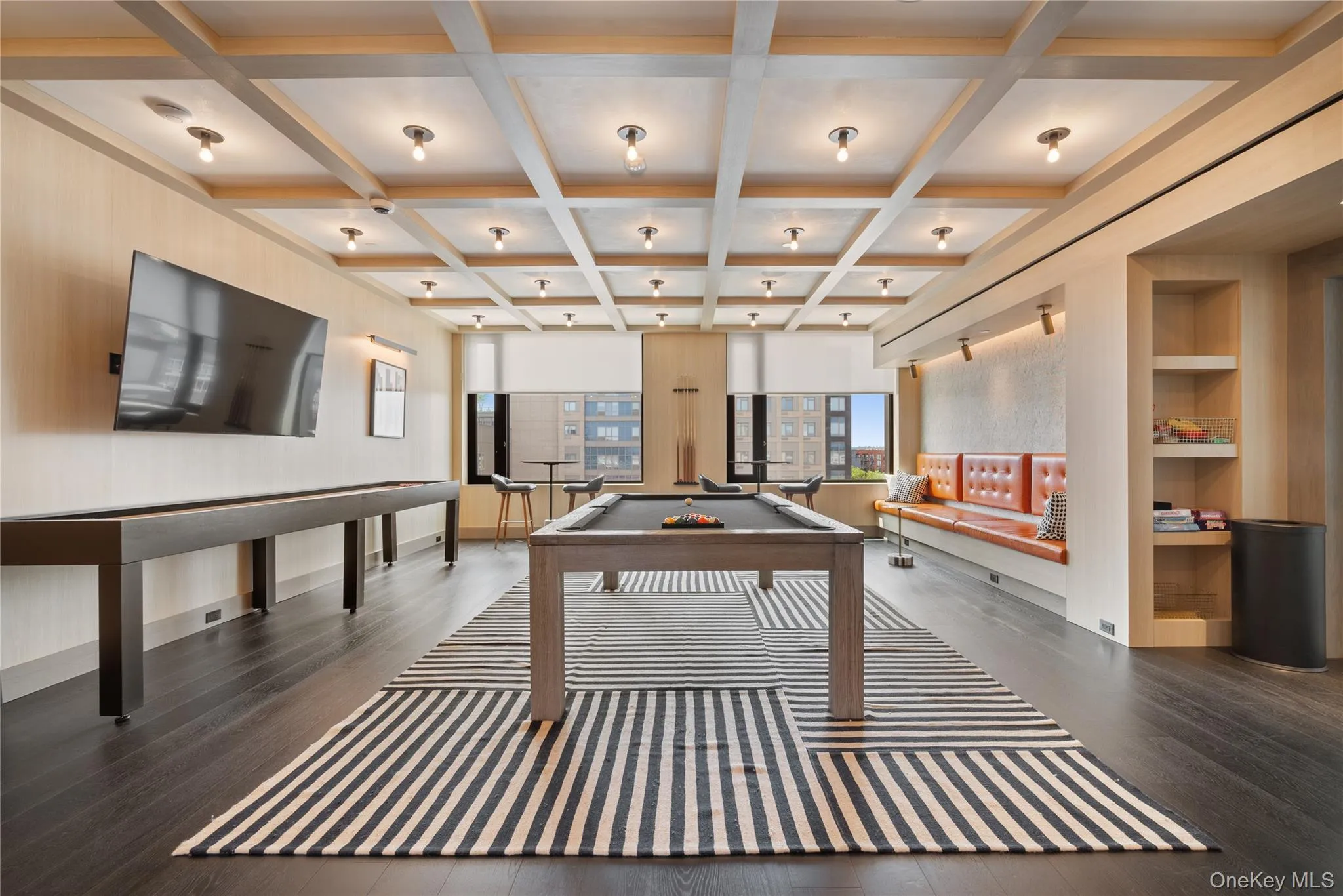 Playroom featuring pool table, beam ceiling, and coffered ceiling Playroom featuring pool table, beam ceiling, and coffered ceiling