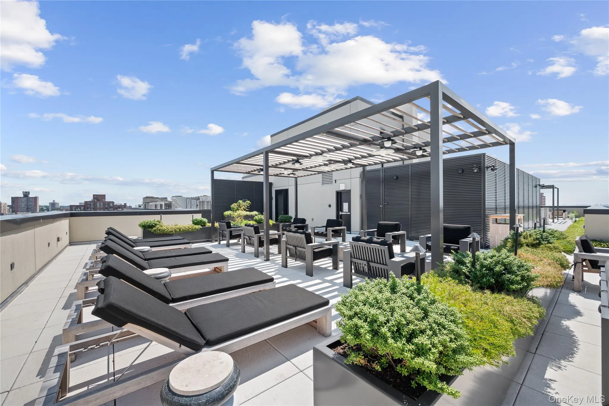 View of patio / terrace featuring an outdoor hangout area, a view of city, and a pergola View of patio / terrace featuring an outdoor hangout area, a view of city, and a pergola