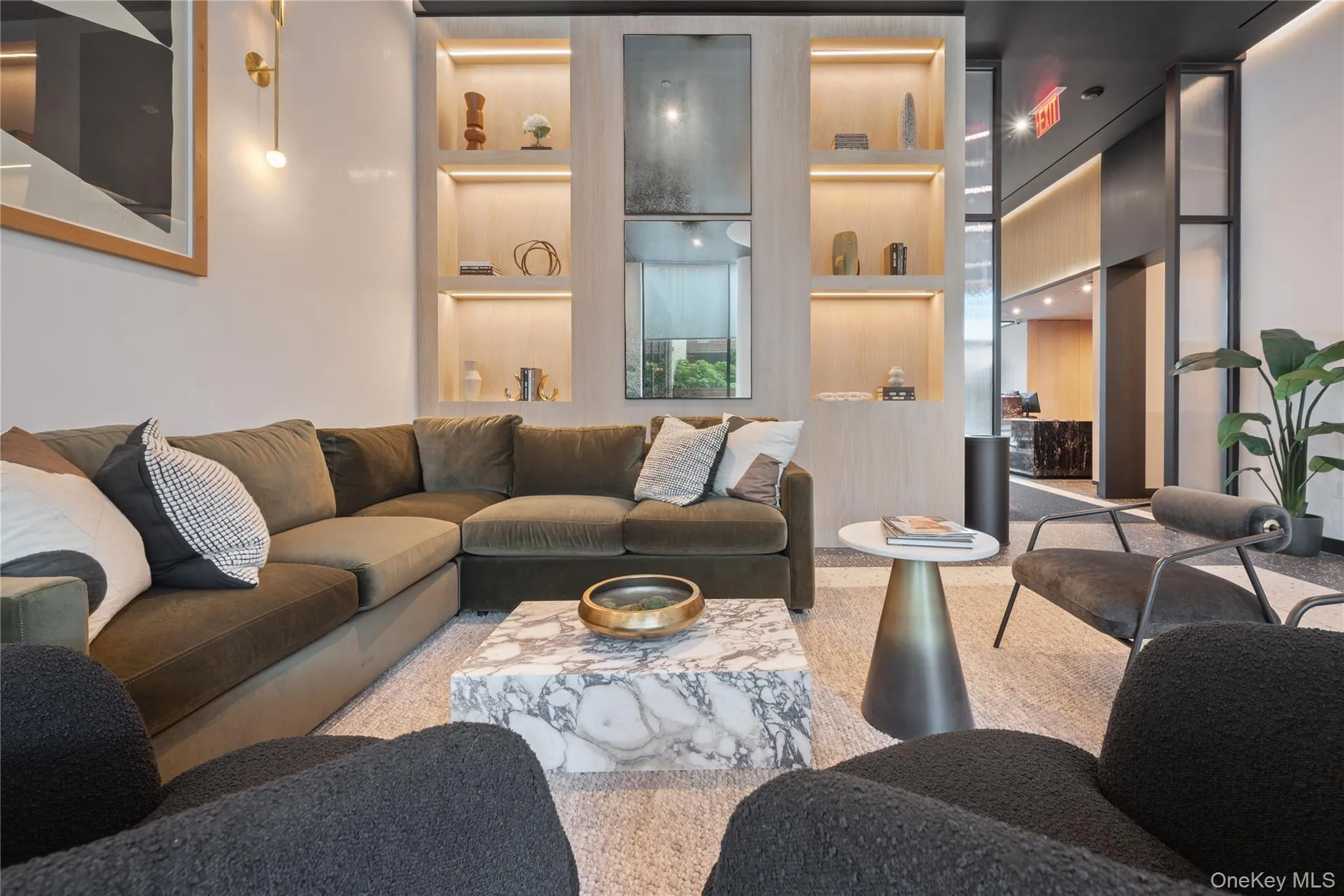 Living room featuring built in features and carpet Living room featuring built in features and carpet