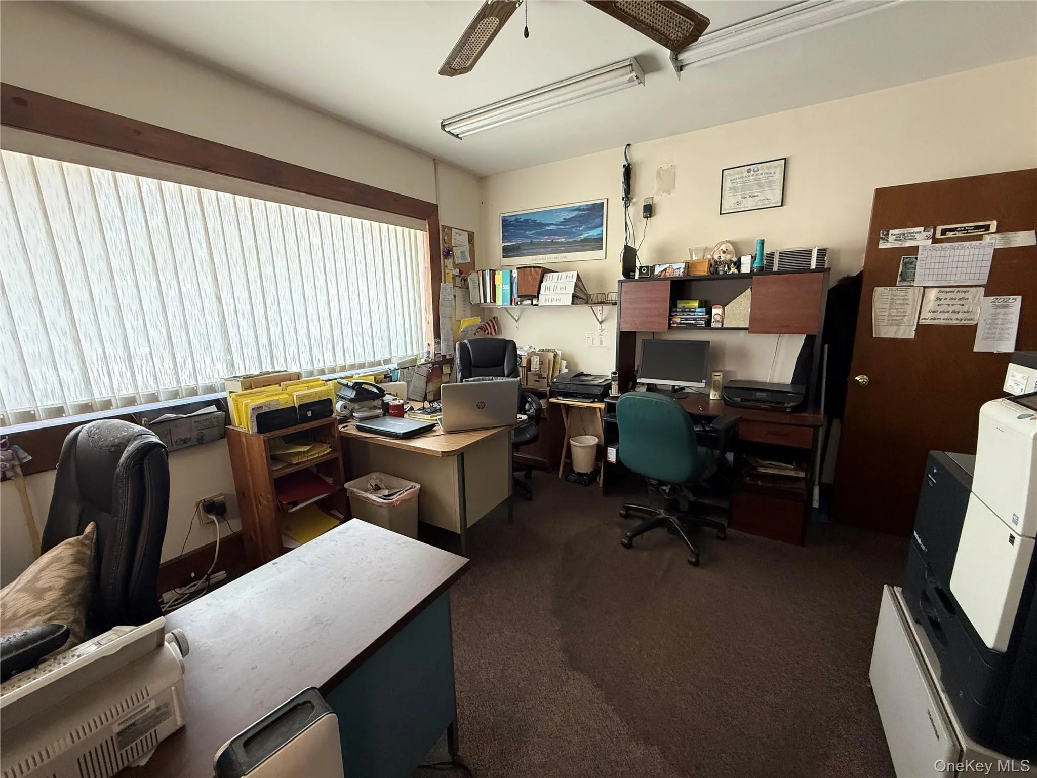 Office area featuring ceiling fan Office area featuring ceiling fan