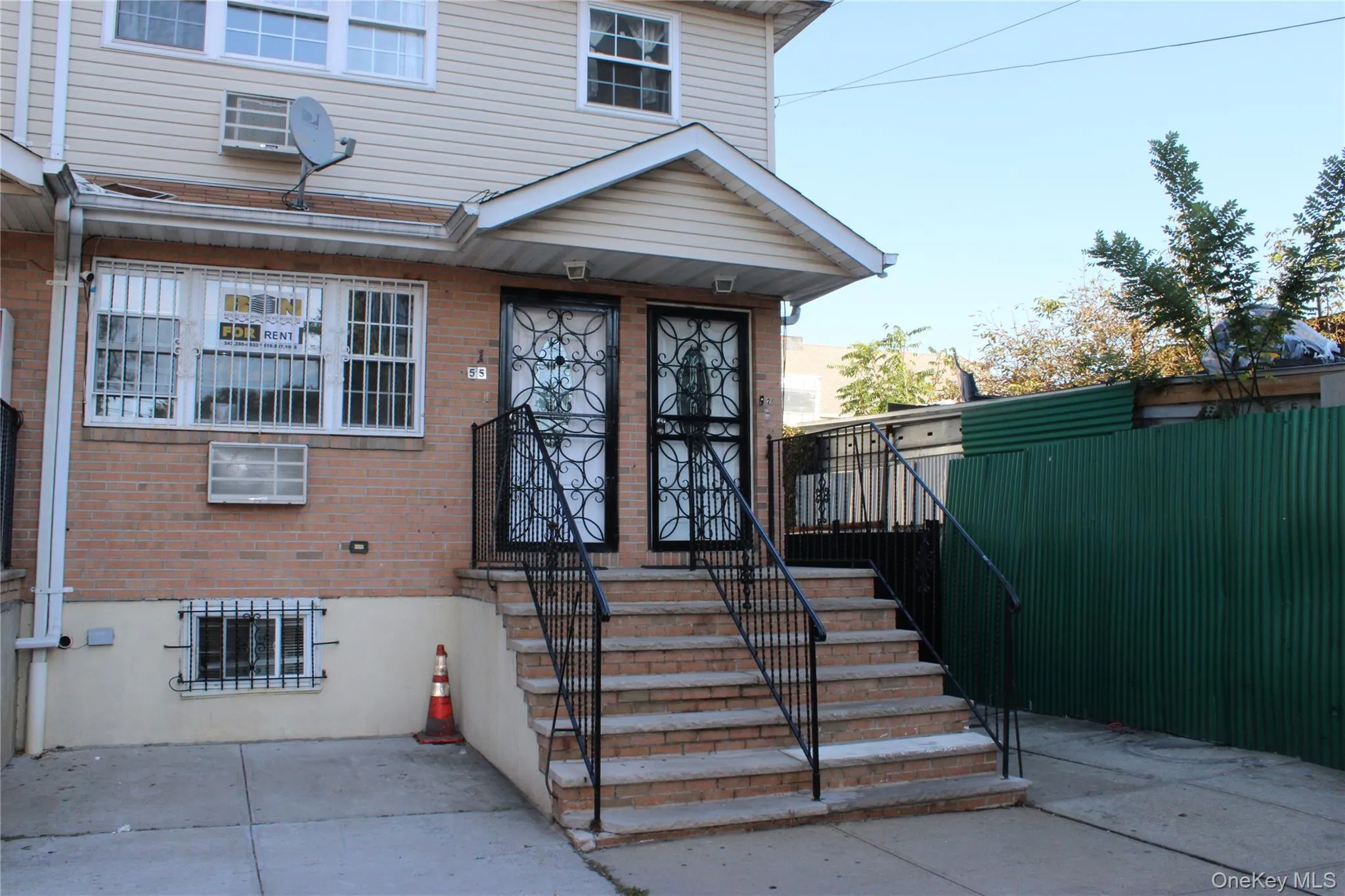Entrance to property featuring brick siding Entrance to property featuring brick siding