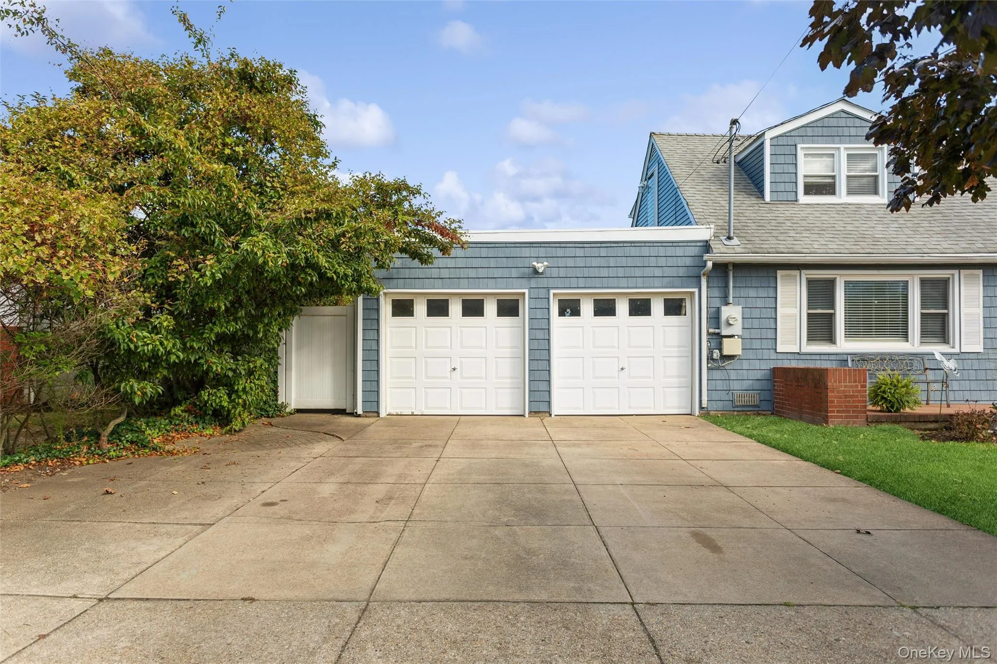 Garage with concrete driveway Garage with concrete driveway