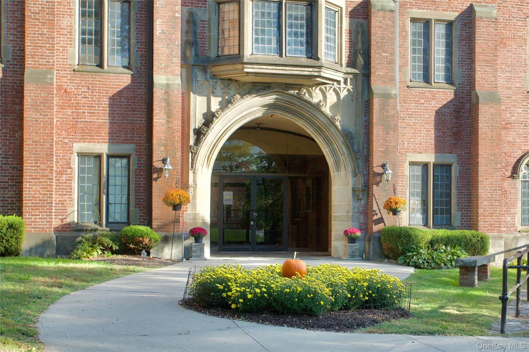 Property entrance featuring french doors and brick siding Property entrance featuring french doors and brick siding