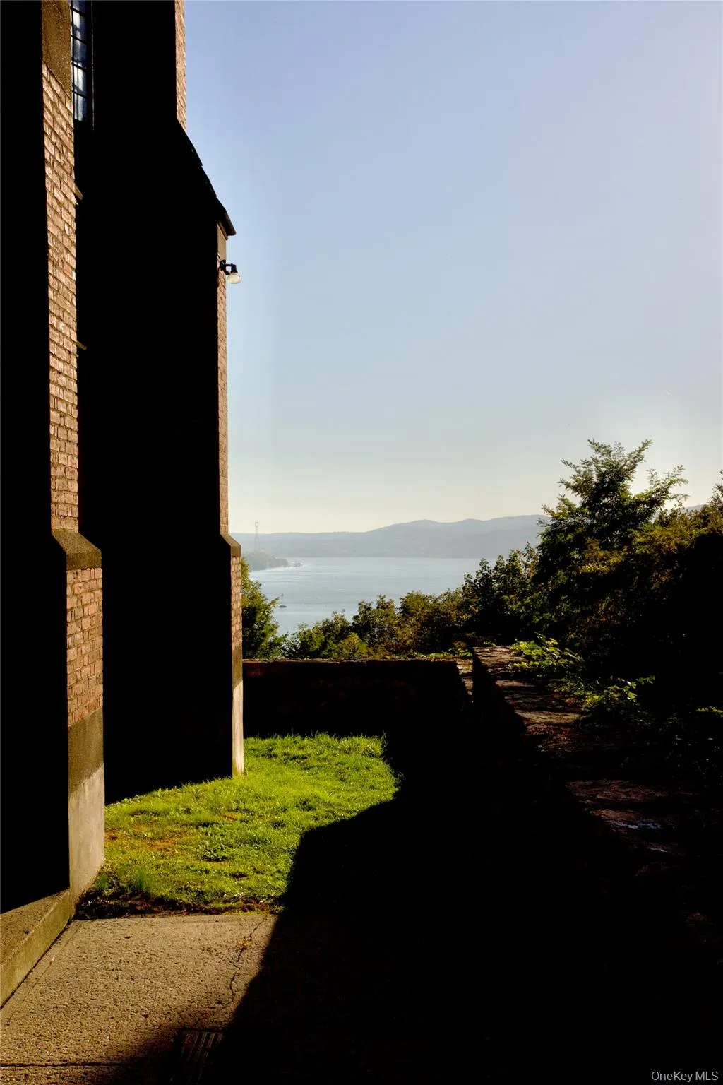 View of green lawn featuring a mountain view View of green lawn featuring a mountain view