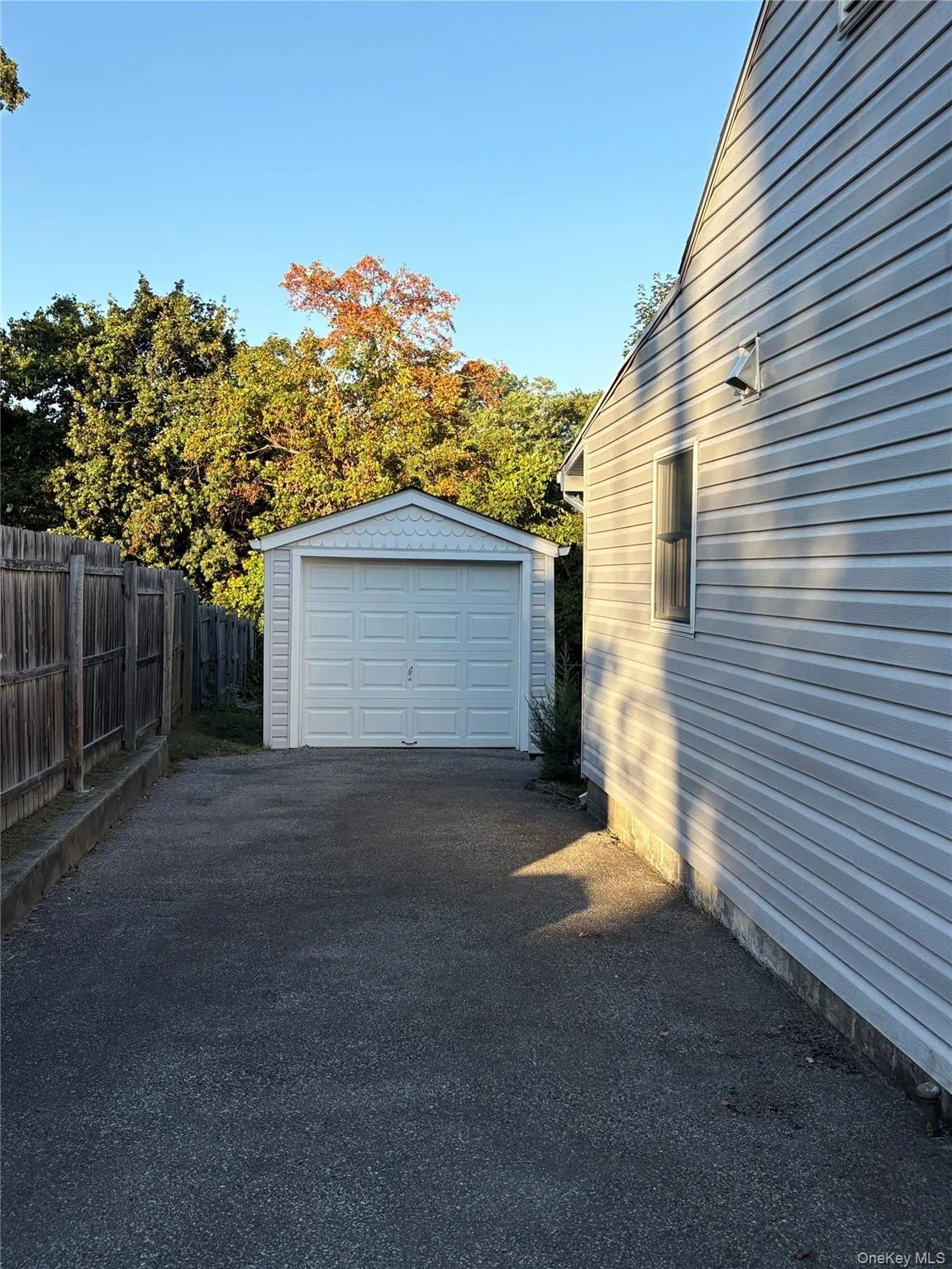 Detached garage with driveway Detached garage with driveway