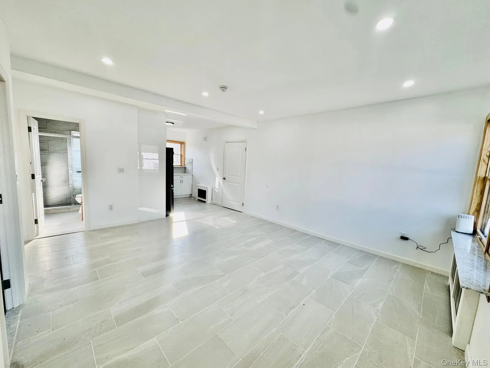 Unfurnished room featuring baseboards and recessed lighting Unfurnished room featuring baseboards and recessed lighting