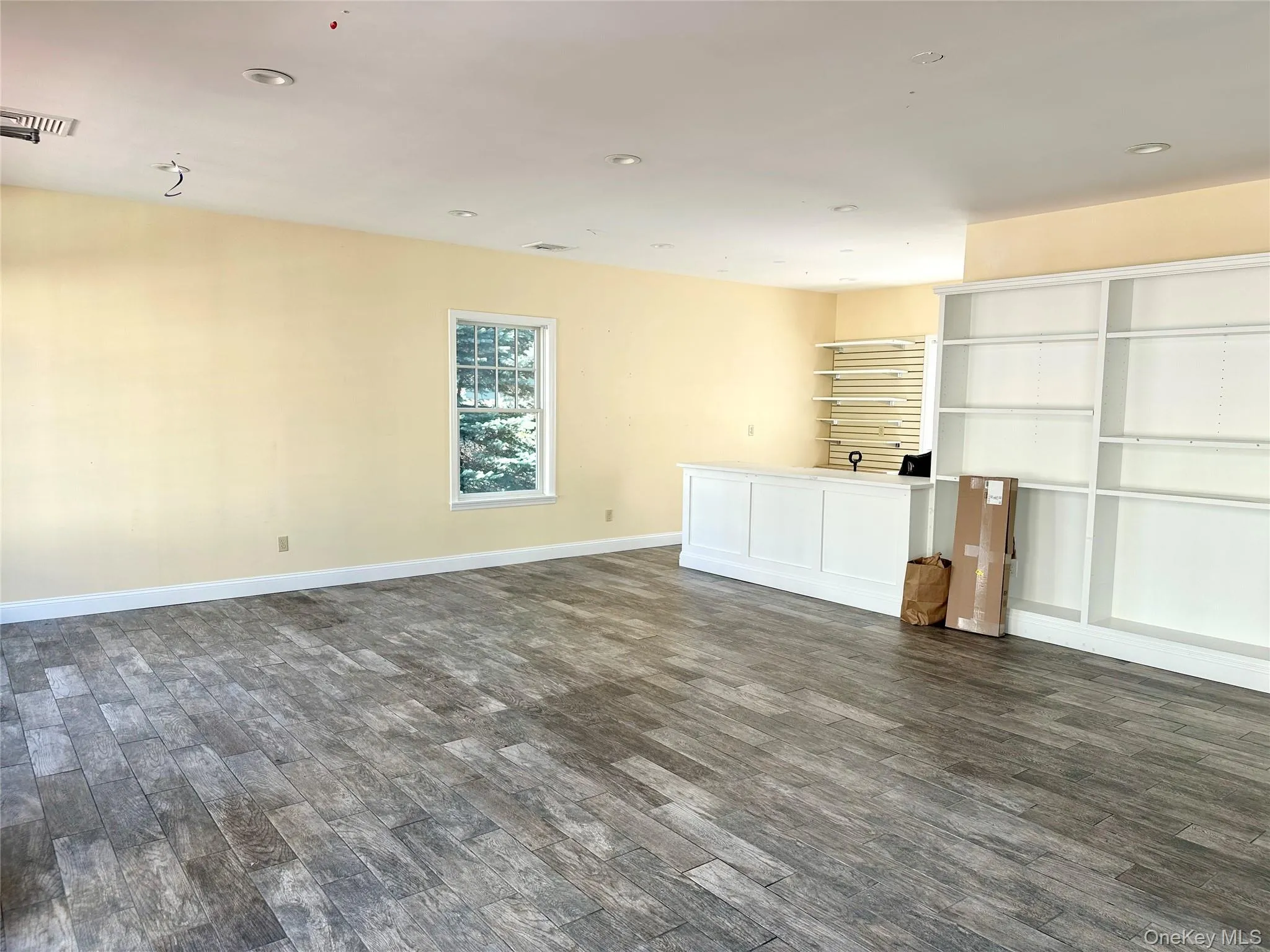 Wood-style flooring and recessed lighting. Wood-style flooring and recessed lighting.