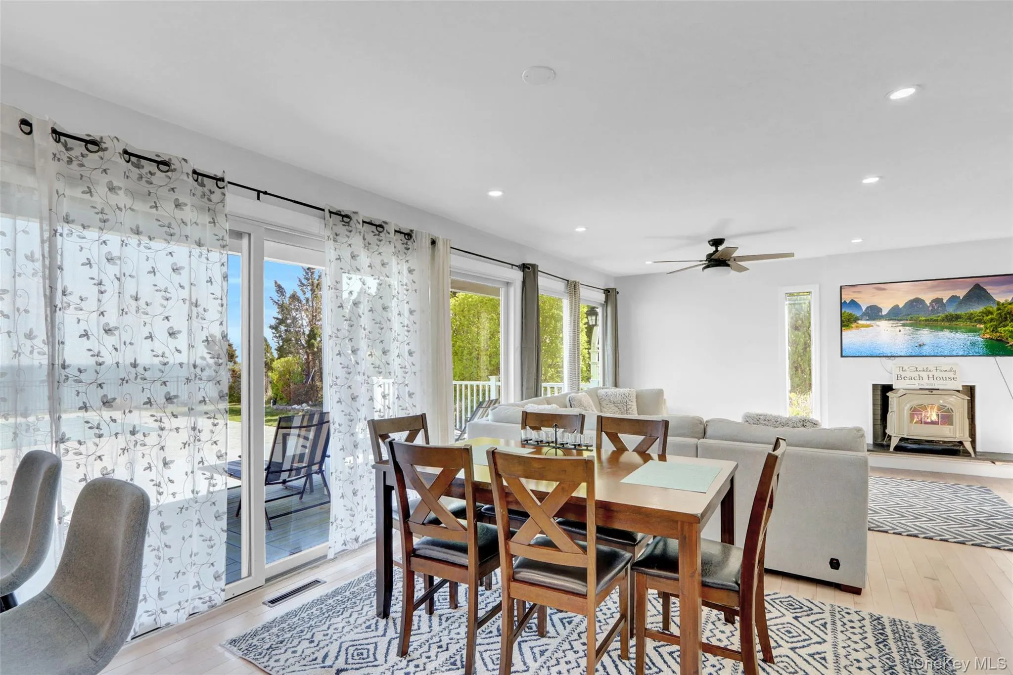 Dining space featuring light wood-style flooring and recessed lighting Dining space featuring light wood-style flooring and recessed lighting