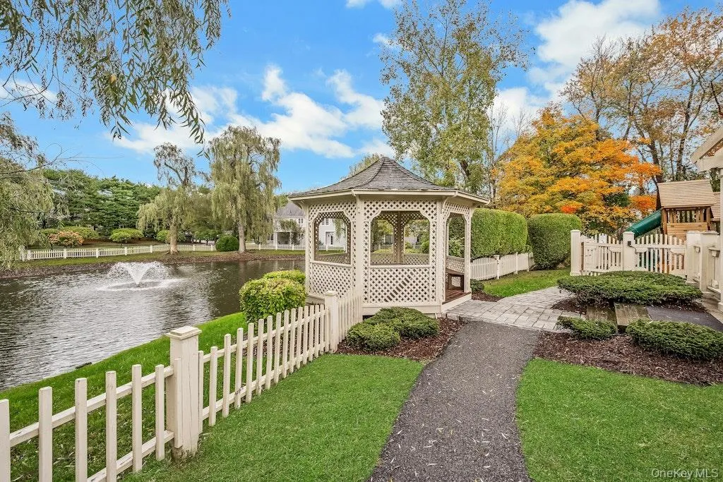 Surrounding community with a gazebo and a water view Surrounding community with a gazebo and a water view