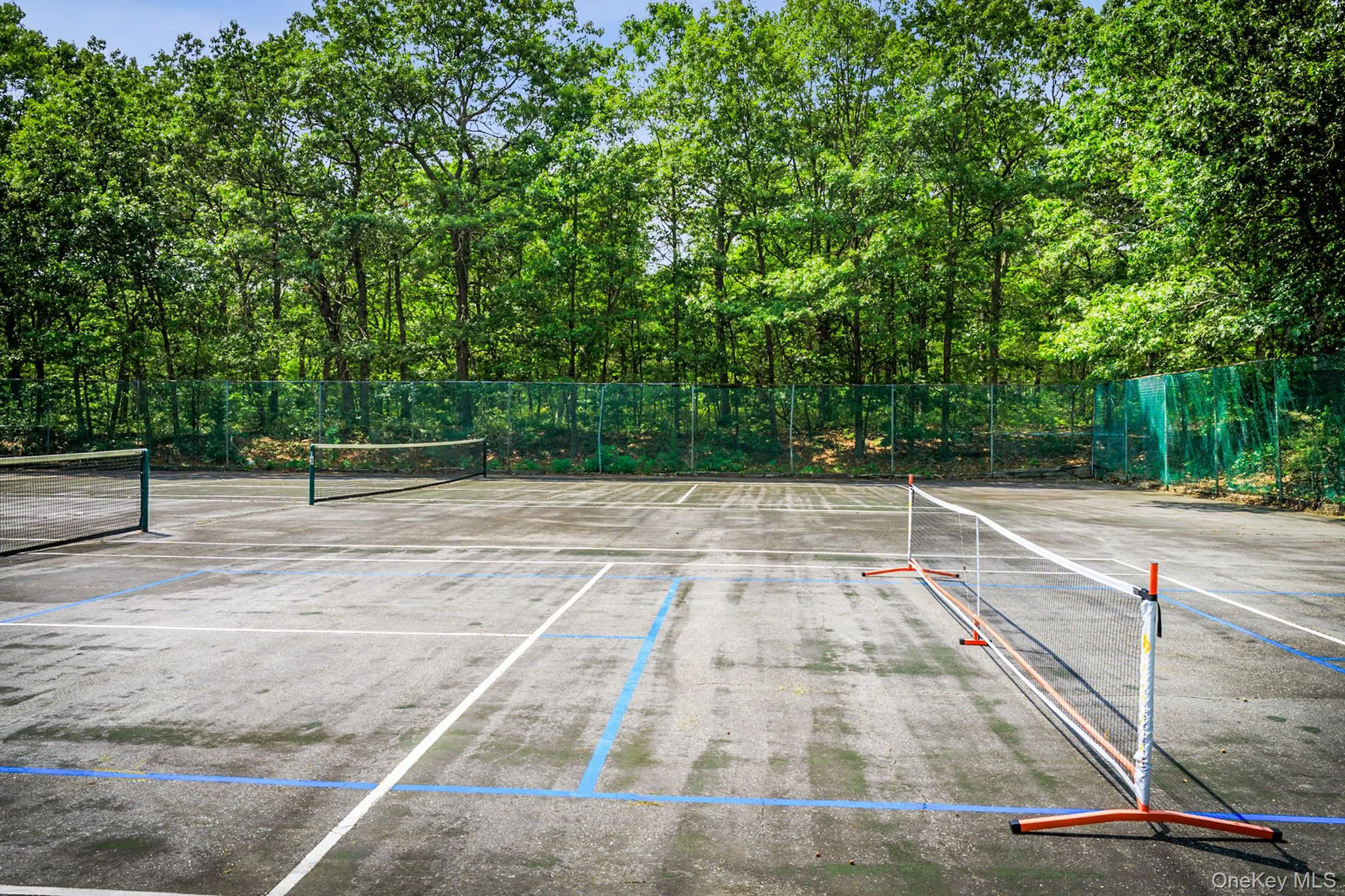 View of tennis court View of tennis court