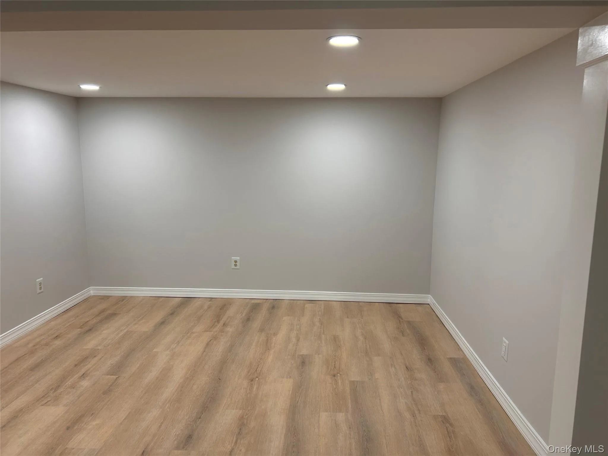 Spare room with recessed lighting and light wood-style floors Spare room with recessed lighting and light wood-style floors