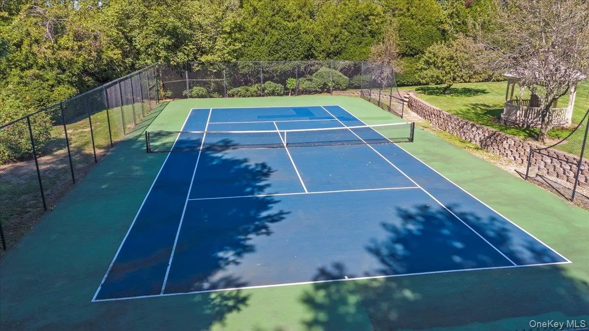 View of tennis court View of tennis court