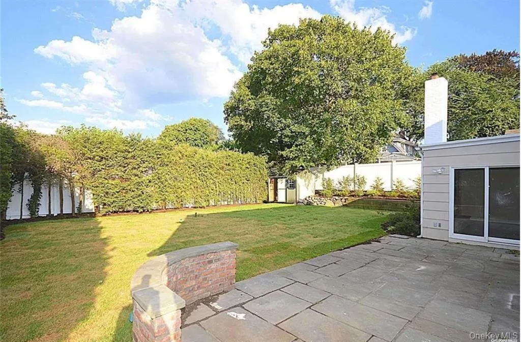 View of yard featuring a patio and a shed View of yard featuring a patio and a shed