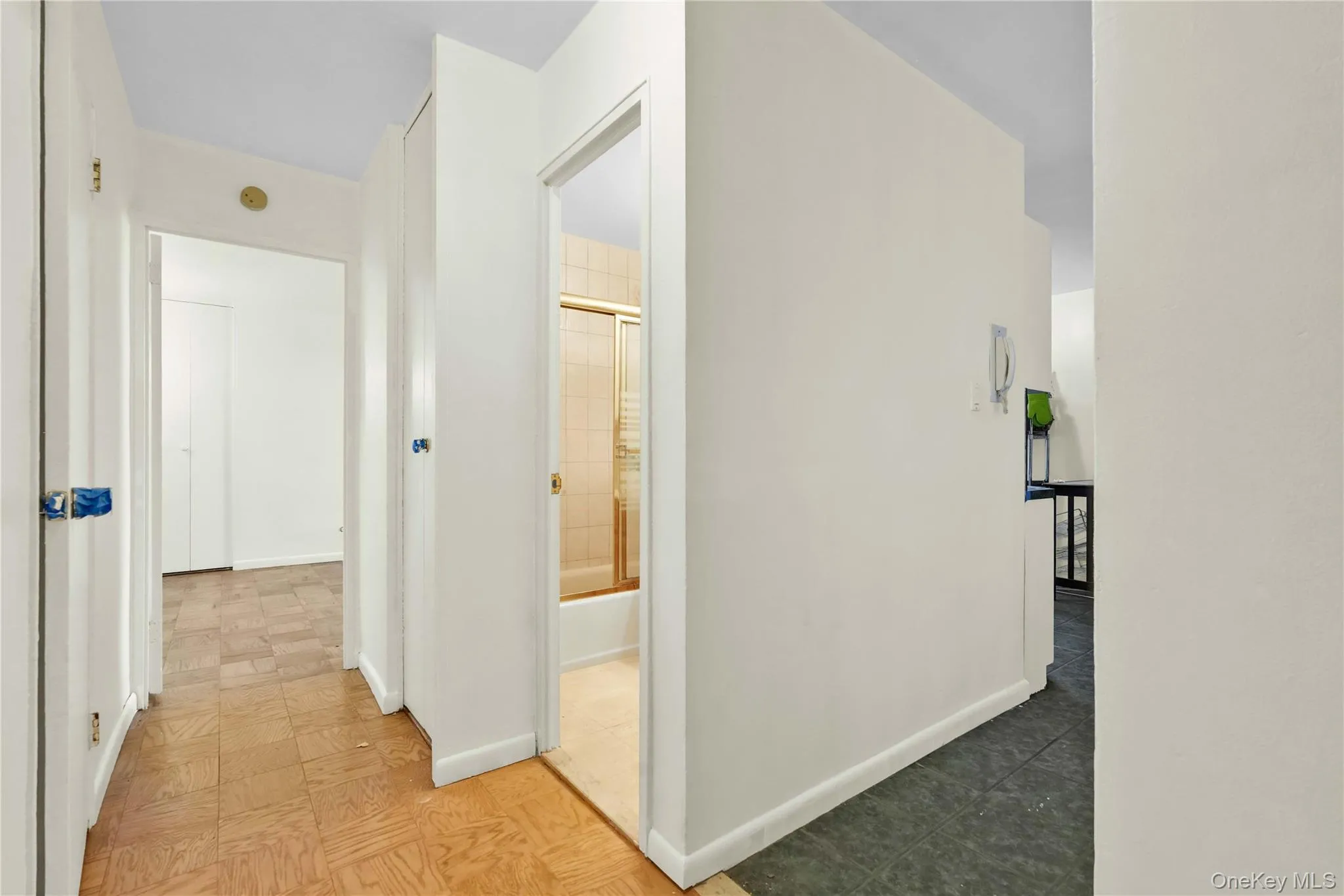 Hallway featuring baseboards Hallway featuring baseboards