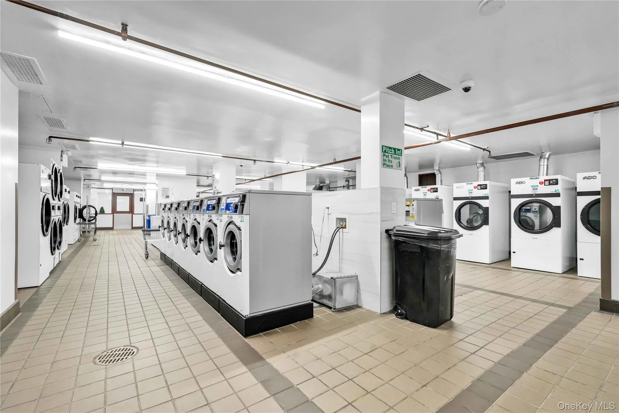 Shared laundry featuring washer and clothes dryer Shared laundry featuring washer and clothes dryer
