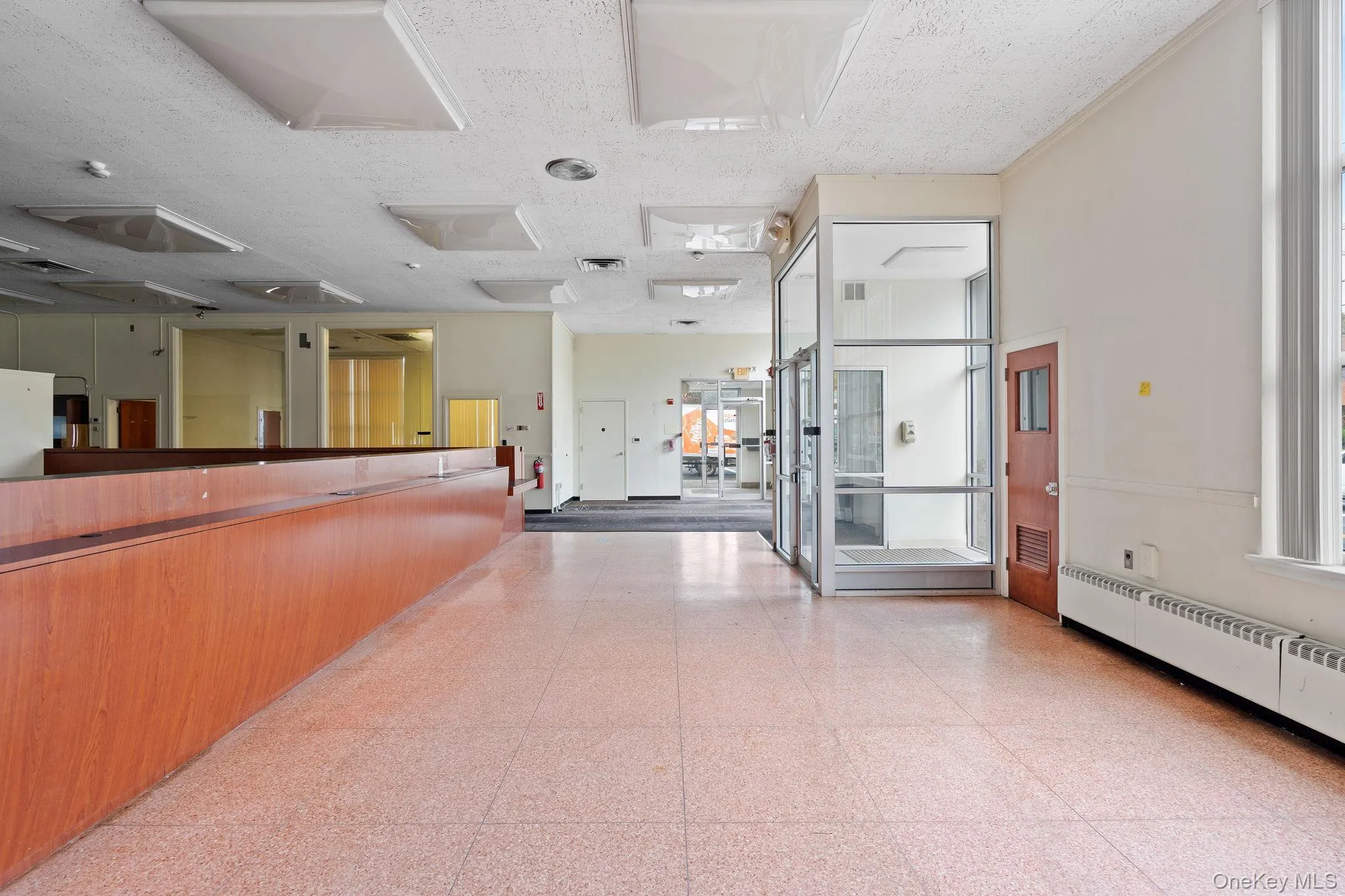 Welcome area featuring a textured ceiling Welcome area featuring a textured ceiling