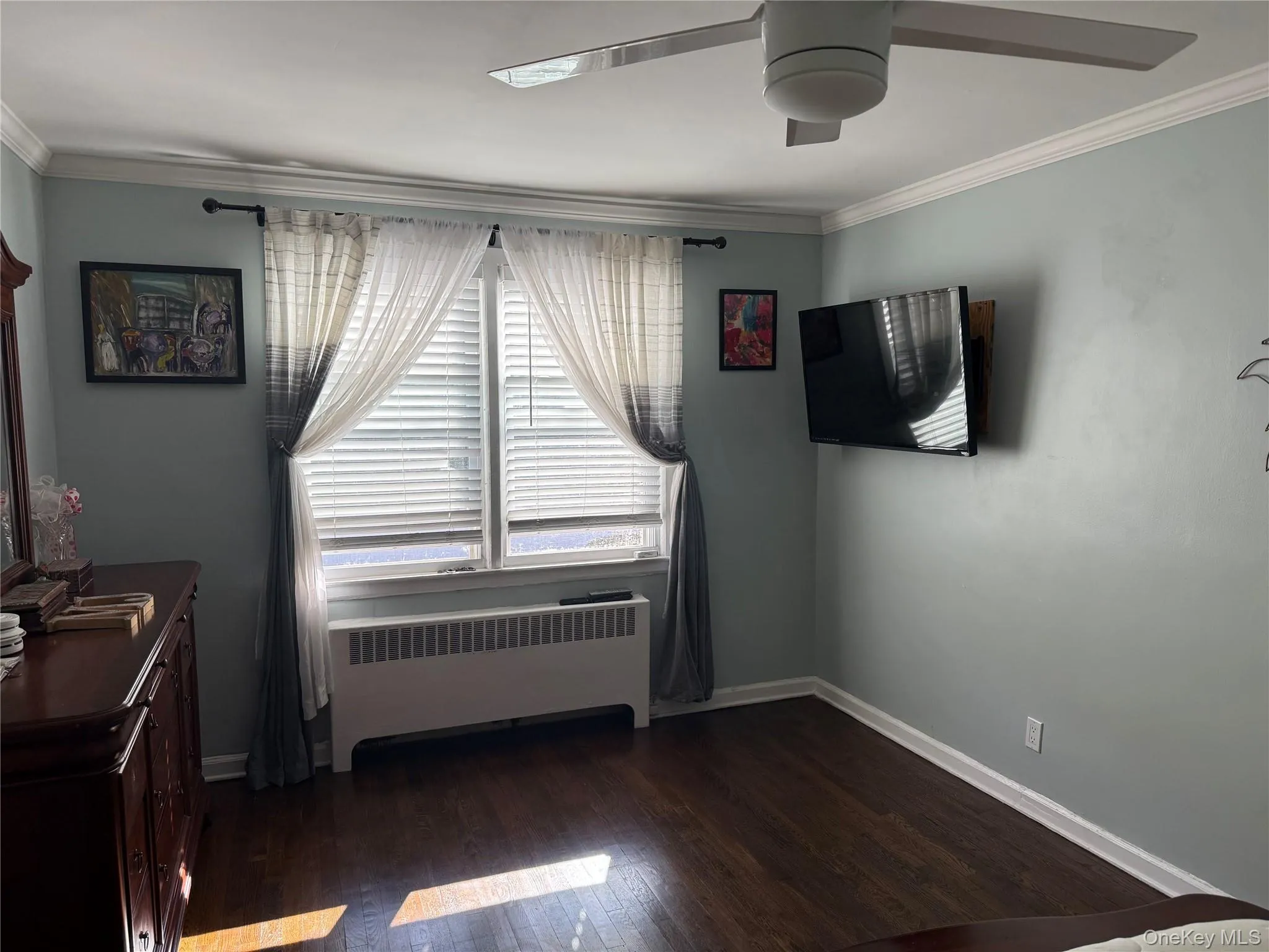 Another view of primary bedroom with double window Another view of primary bedroom with double window