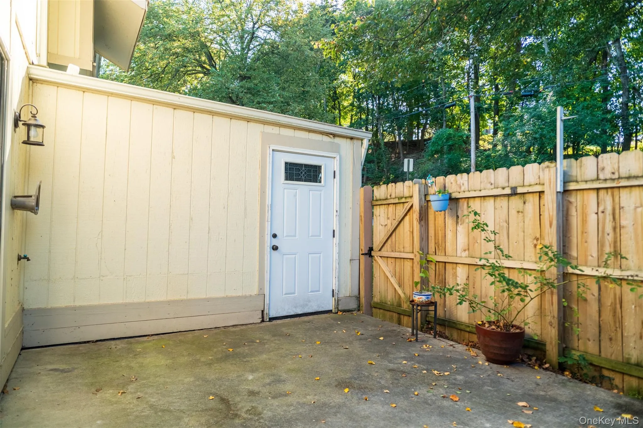 View of outbuilding with a gate View of outbuilding with a gate