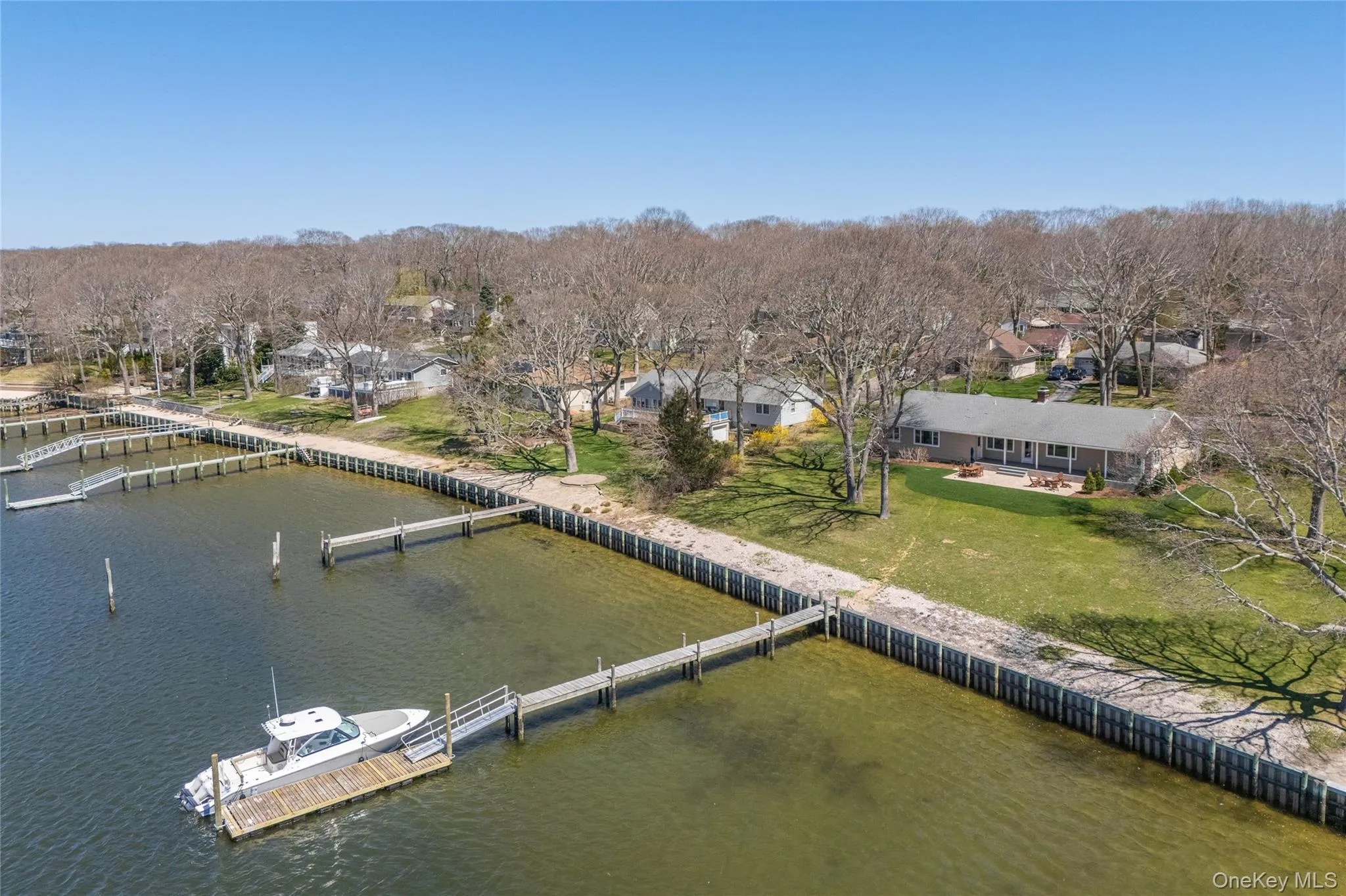 Aerial view featuring a residential view and a water view Aerial view featuring a residential view and a water view