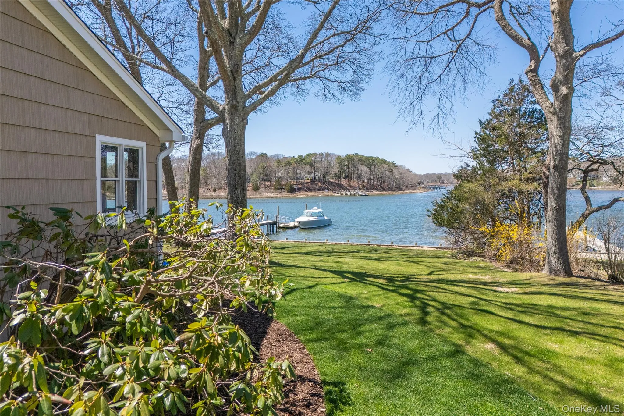 View of yard featuring a water view View of yard featuring a water view