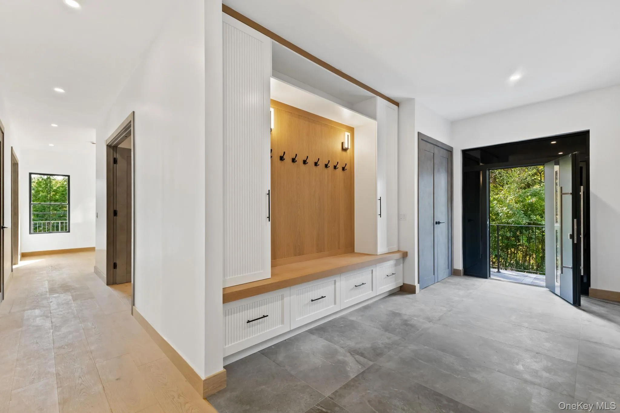 Mudroom featuring recessed lighting and baseboards Mudroom featuring recessed lighting and baseboards