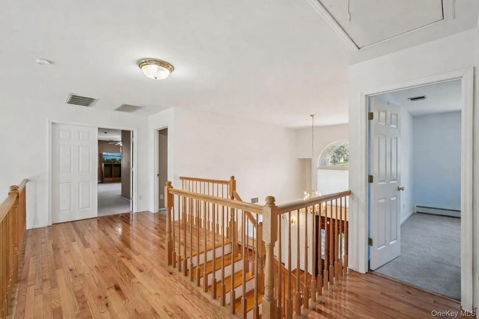 Upstairs landing leads to 4 bed rooms. Landing has views below to foyer and great room Upstairs landing leads to 4 bed rooms. Landing has views below to foyer and great room