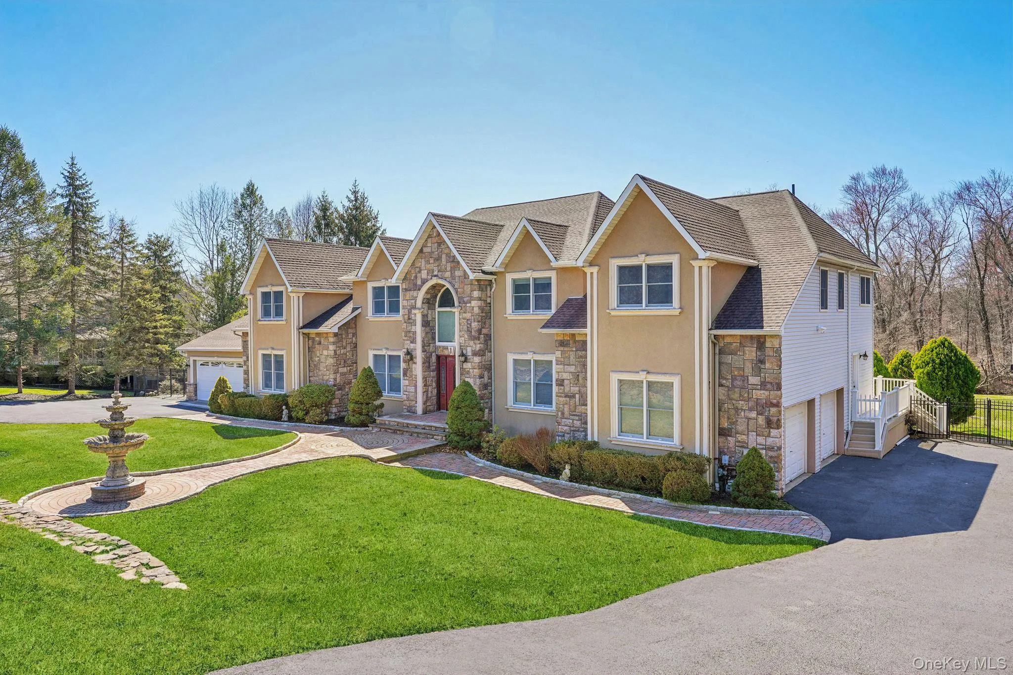 This 6 bedroom colonial has a 2 story addition with its own 2 car garage This 6 bedroom colonial has a 2 story addition with its own 2 car garage