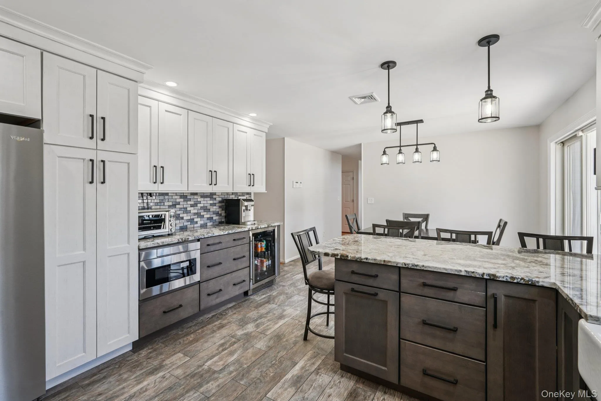 Beverage fridge, loads of granite counters, pantry and a microwave drawer Beverage fridge, loads of granite counters, pantry and a microwave drawer