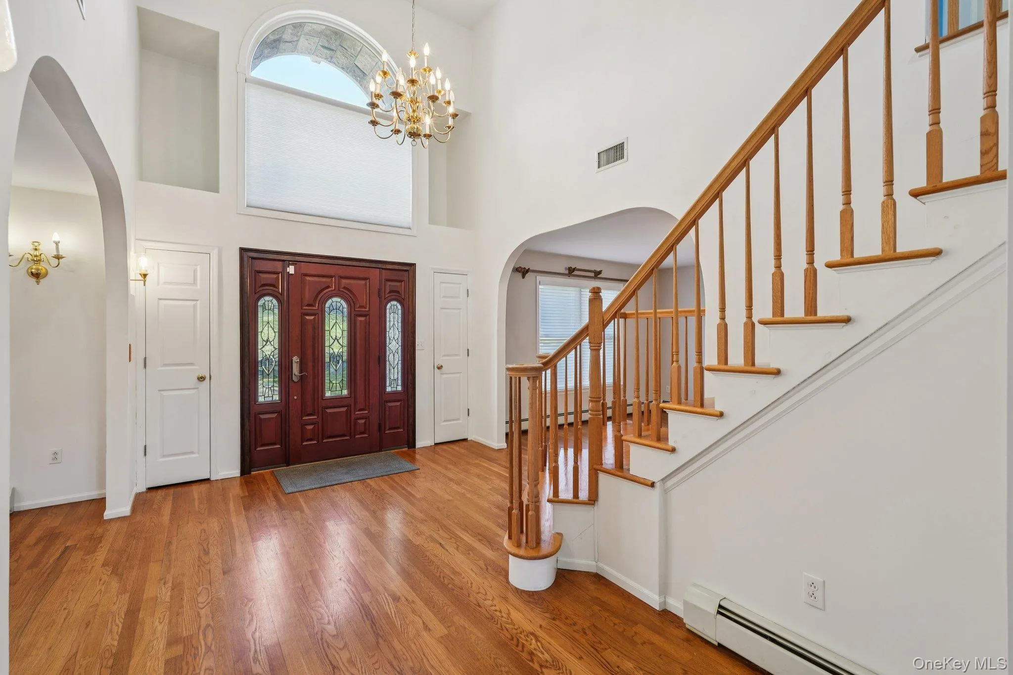 Impressive entry flanked by 2 coat closets Impressive entry flanked by 2 coat closets