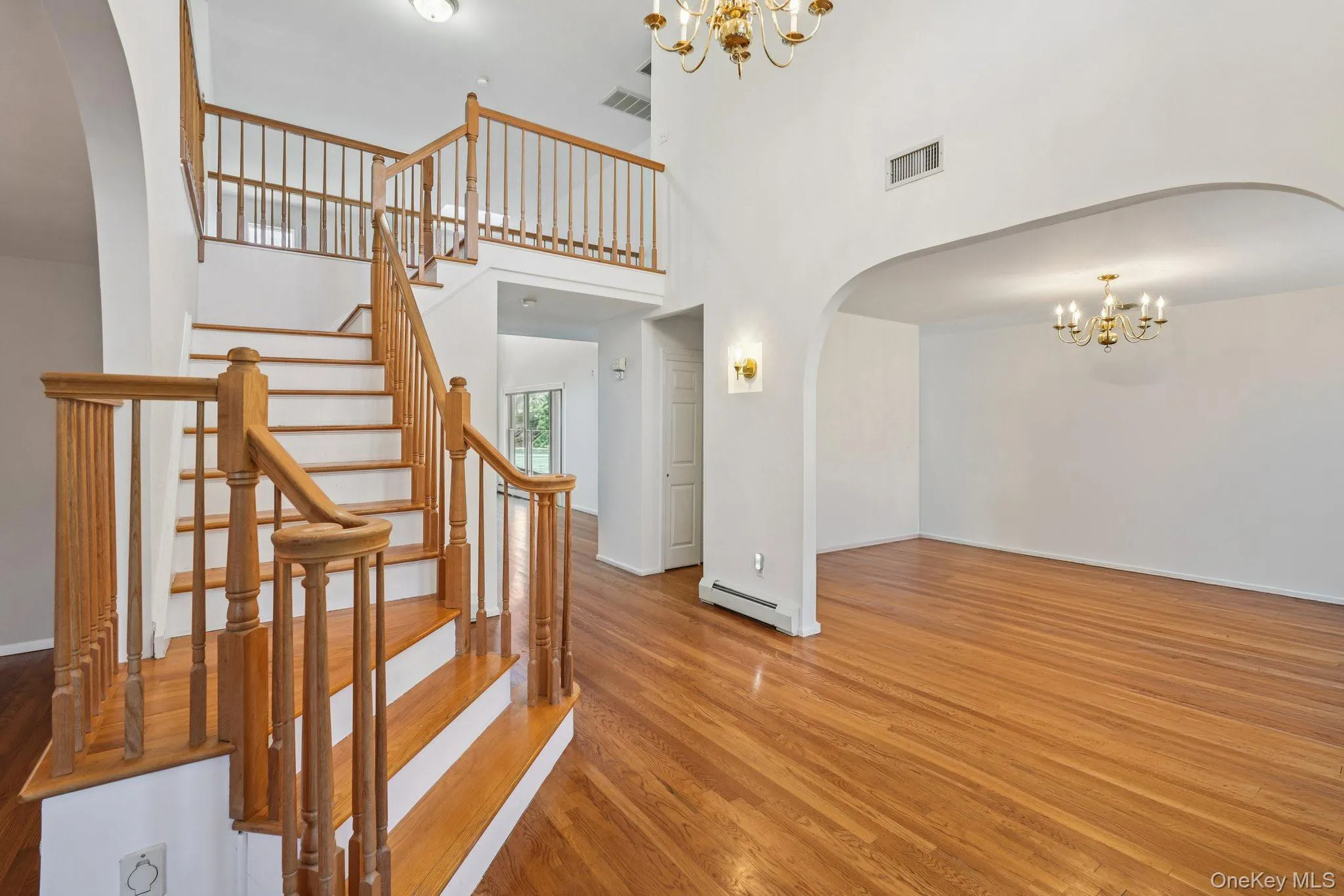 2 story entry with view to dining room 2 story entry with view to dining room
