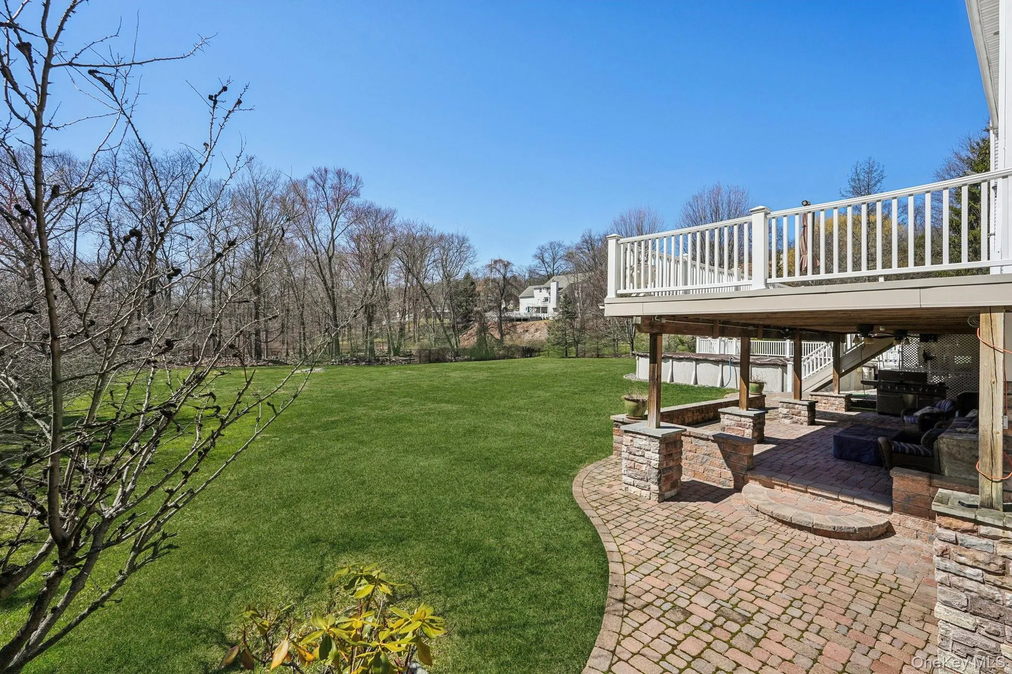 Almost an acre of fenced, level property. Pavered patio and covered seating area, gas grill Almost an acre of fenced, level property. Pavered patio and covered seating area, gas grill