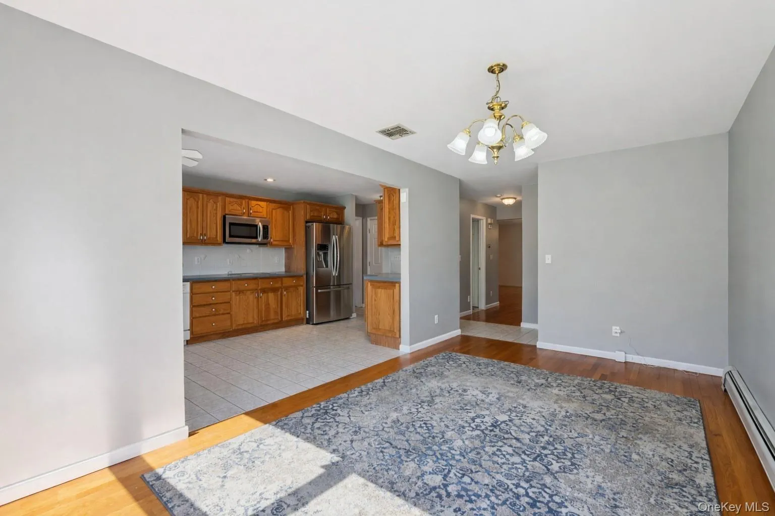 Dining room with view to summer kitchen Dining room with view to summer kitchen