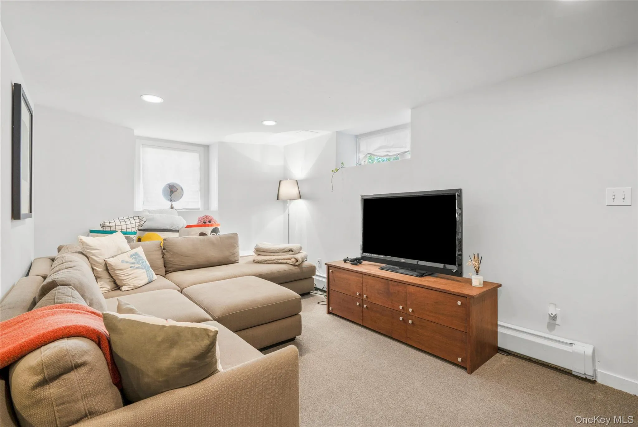 Living area/Guest room carpeted flooring, and recessed lighting Living area/Guest room carpeted flooring, and recessed lighting