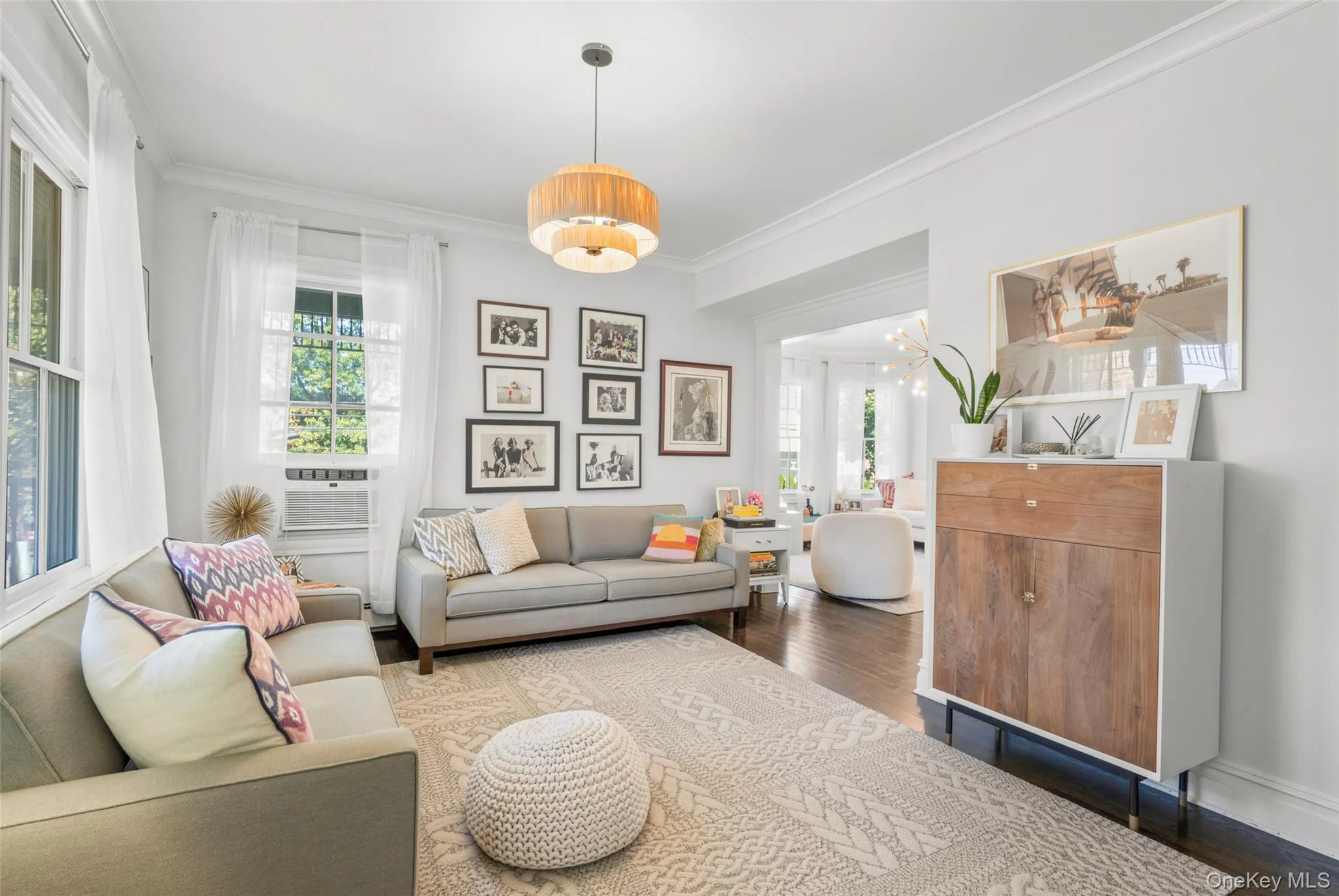 Living room with hardwood floors, crown molding Living room with hardwood floors, crown molding