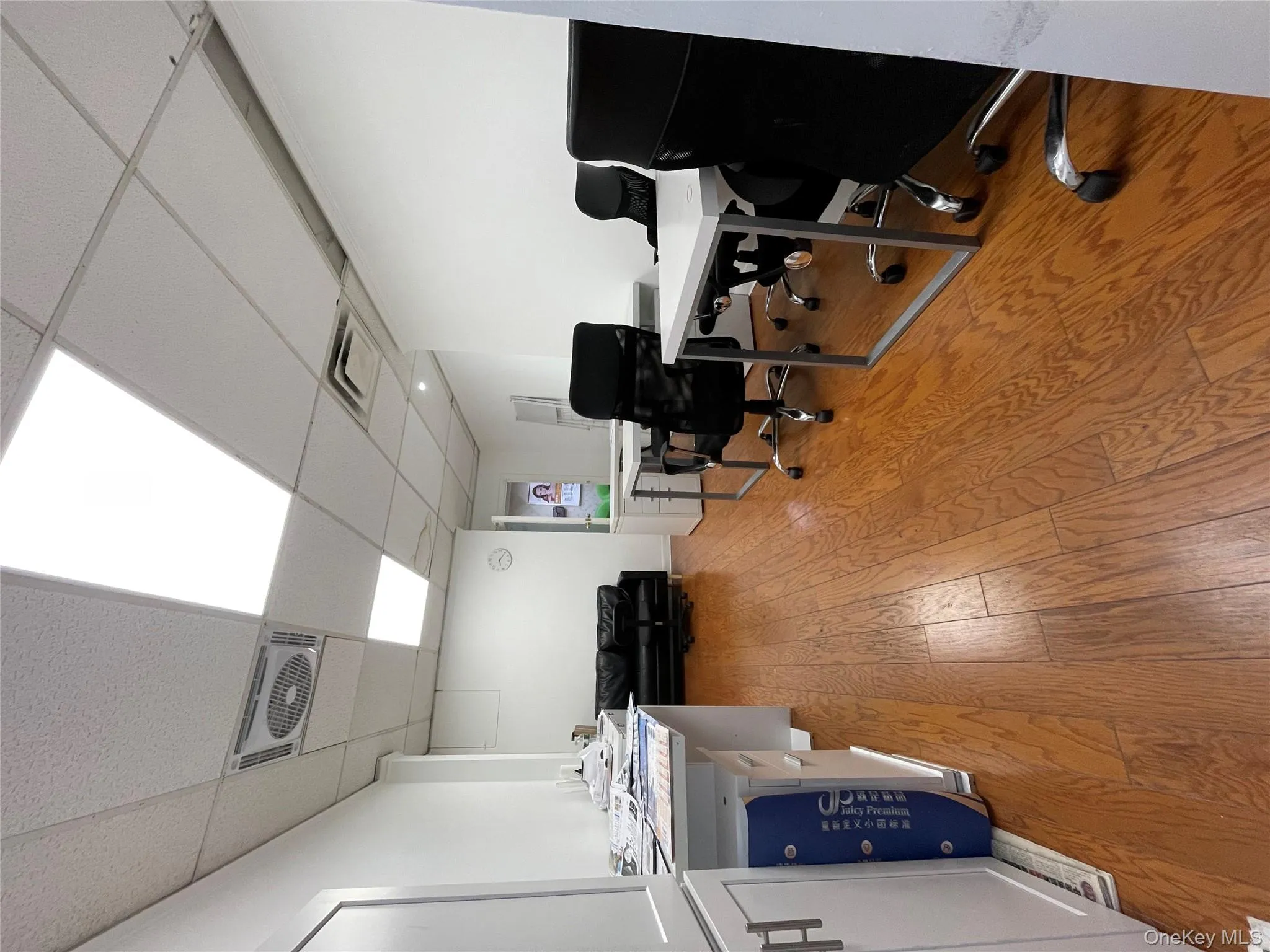 Office featuring a drop ceiling Office featuring a drop ceiling