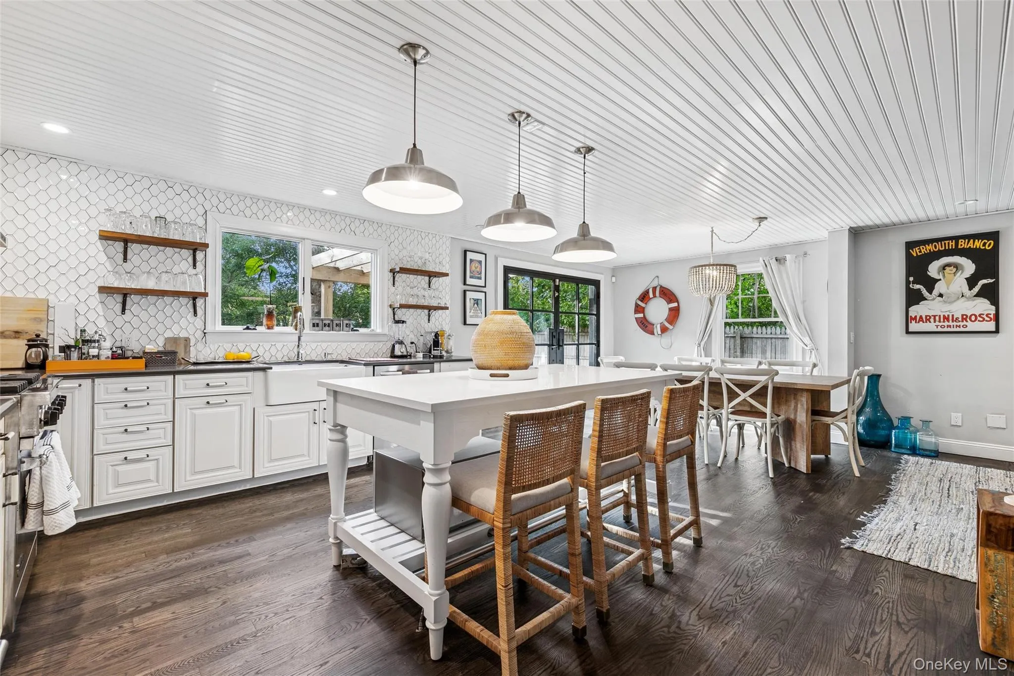 Kitchen featuring open shelves, tasteful backsplash, pendant lighting, dark wood-style flooring, and recessed lighting Kitchen featuring open shelves, tasteful backsplash, pendant lighting, dark wood-style flooring, and recessed lighting