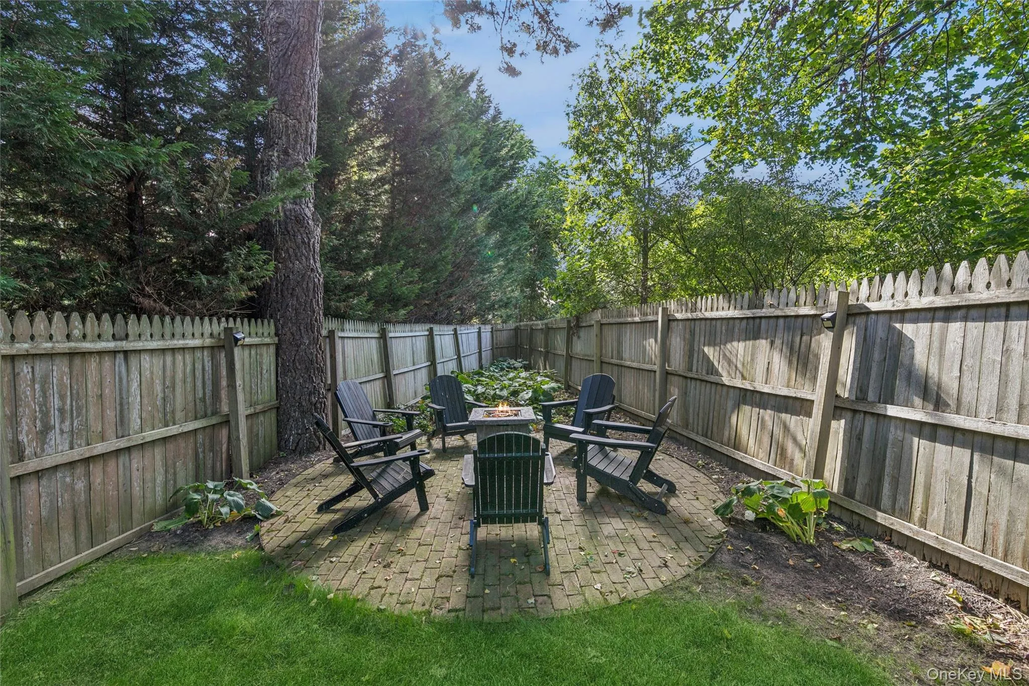 Fenced backyard featuring a patio Fenced backyard featuring a patio