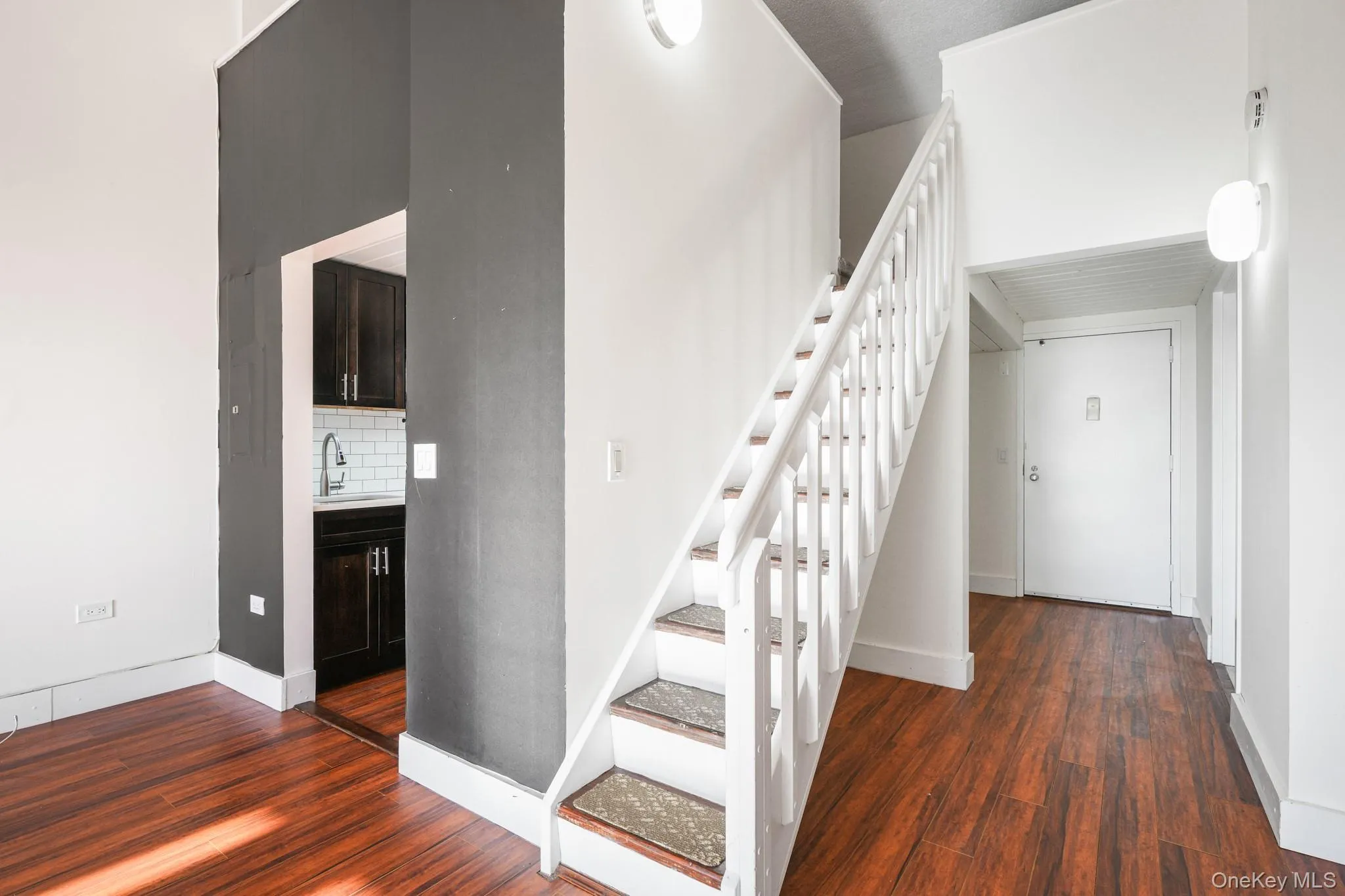 Entry hall and stairs to loft Entry hall and stairs to loft