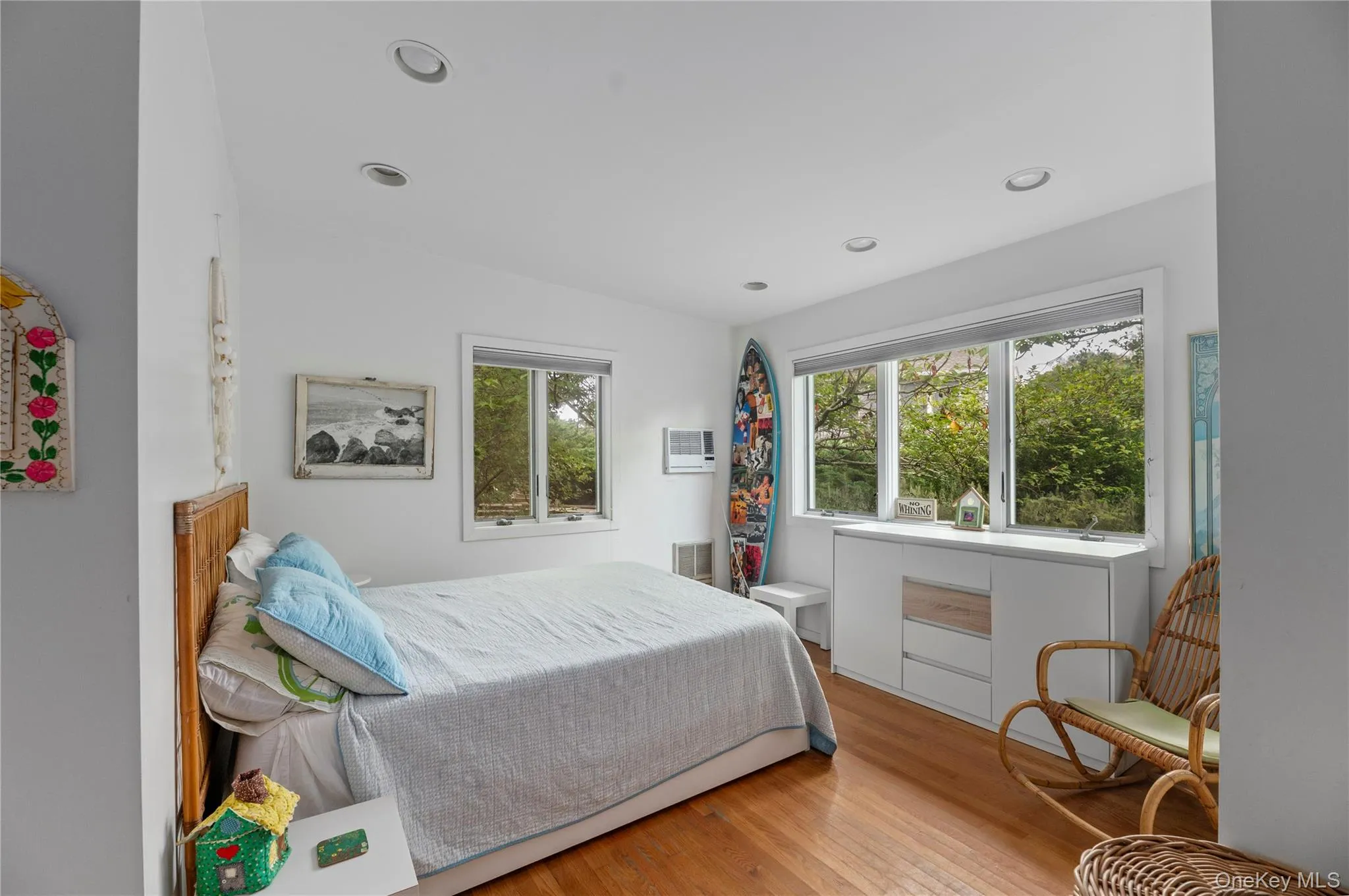 Bedroom featuring wood finished floors and recessed lighting Bedroom featuring wood finished floors and recessed lighting