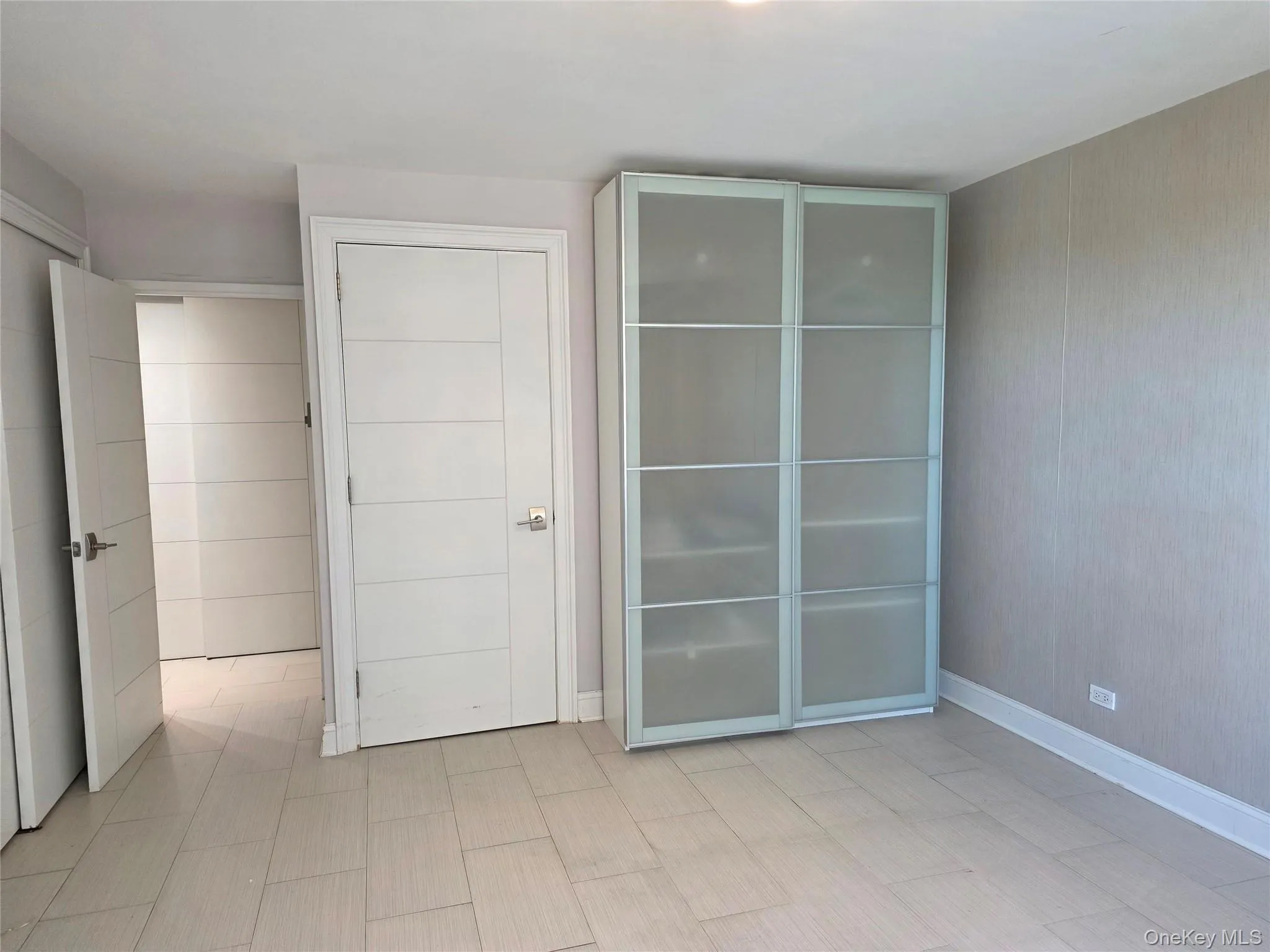 Unfurnished bedroom with baseboards Unfurnished bedroom with baseboards
