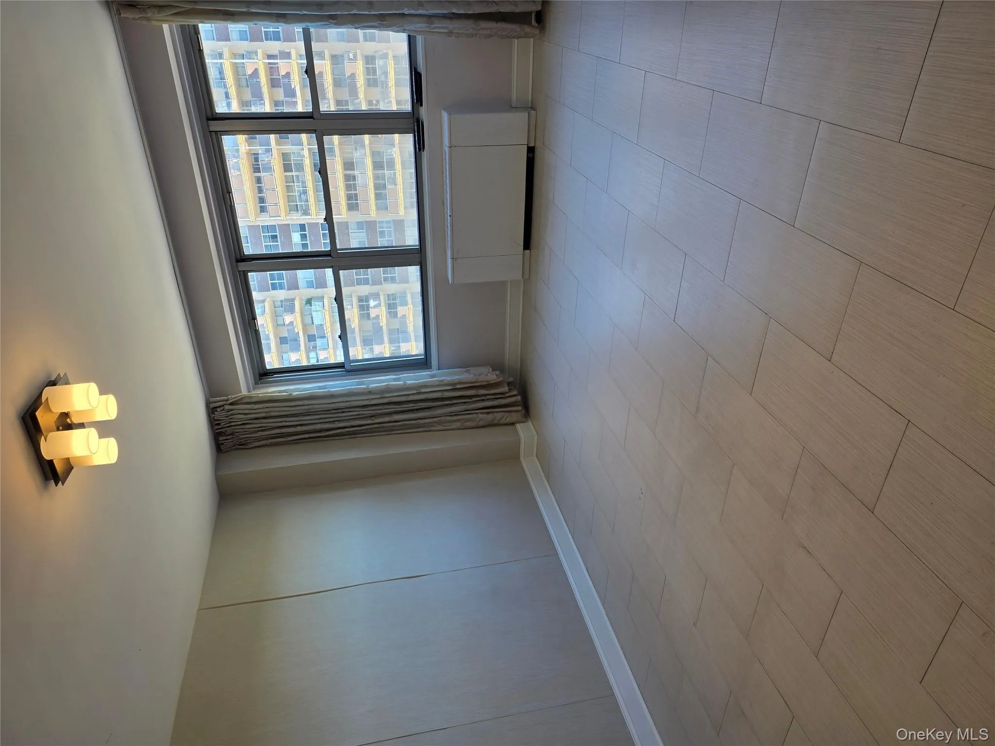 Empty room with baseboards and radiator heating unit Empty room with baseboards and radiator heating unit