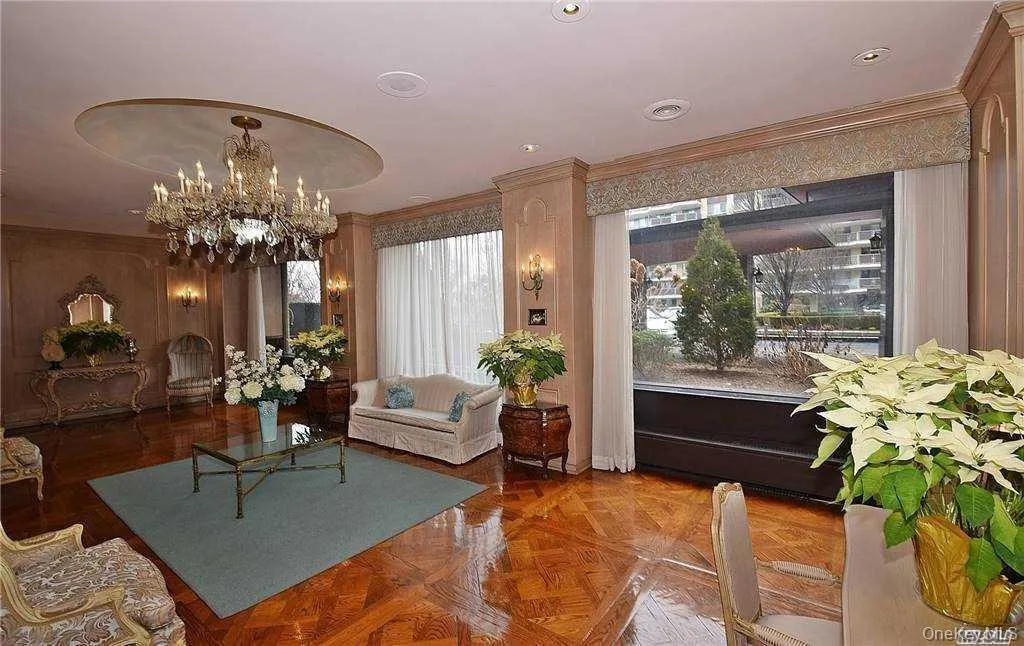 Building lobby featuring crown molding Building lobby featuring crown molding