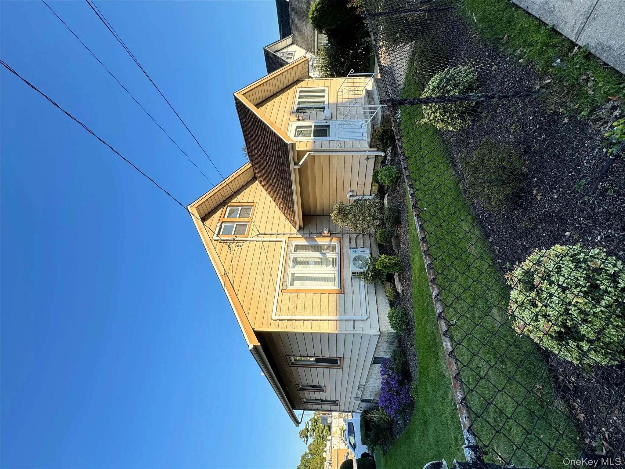 View of front of home featuring a fenced front yard View of front of home featuring a fenced front yard