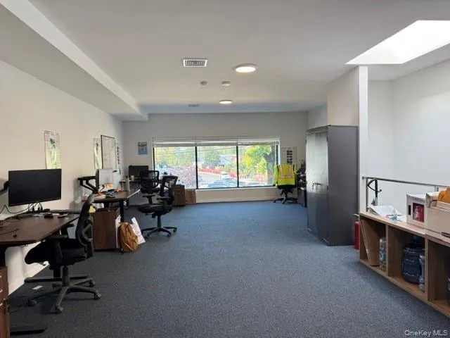 Office area featuring a skylight Office area featuring a skylight