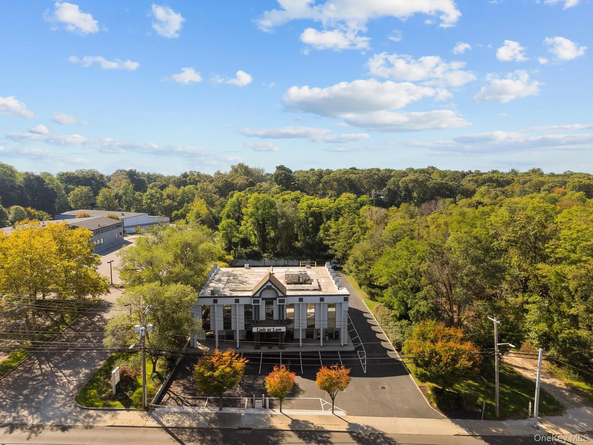 View from above of property featuring a forest View from above of property featuring a forest