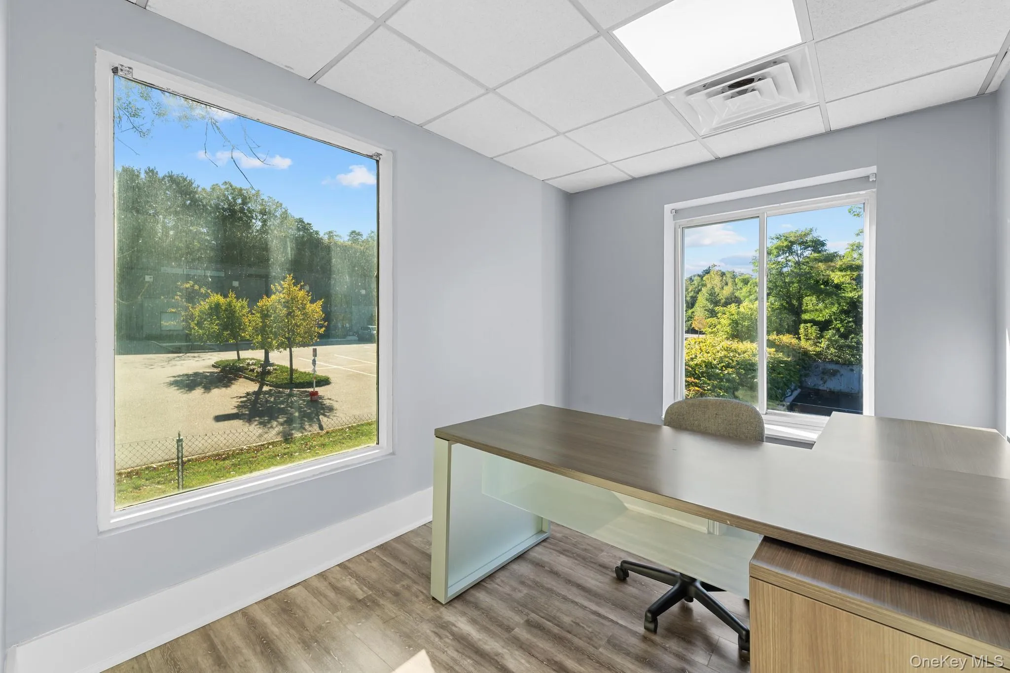 2nd Private office featuring plenty of natural light and a paneled ceiling 2nd Private office featuring plenty of natural light and a paneled ceiling