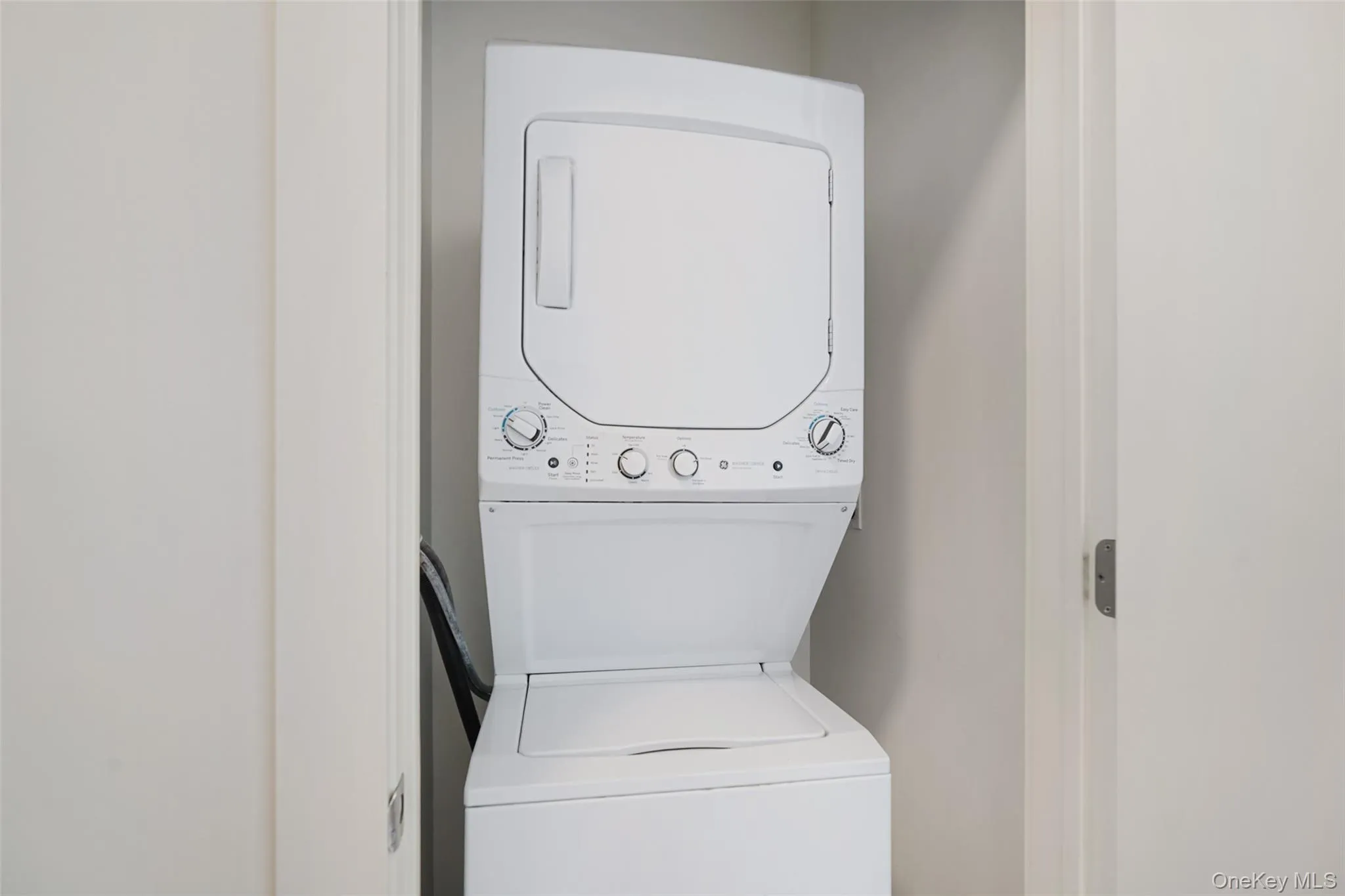 Laundry area with stacked washer/dryer Laundry area with stacked washer/dryer