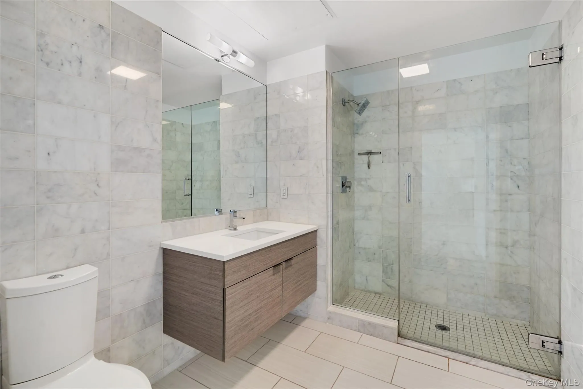 *Photos of alternate unit in the building with the same finishes. Views/layout differs per unit* *Photos of alternate unit in the building with the same finishes. Views/layout differs per unit*