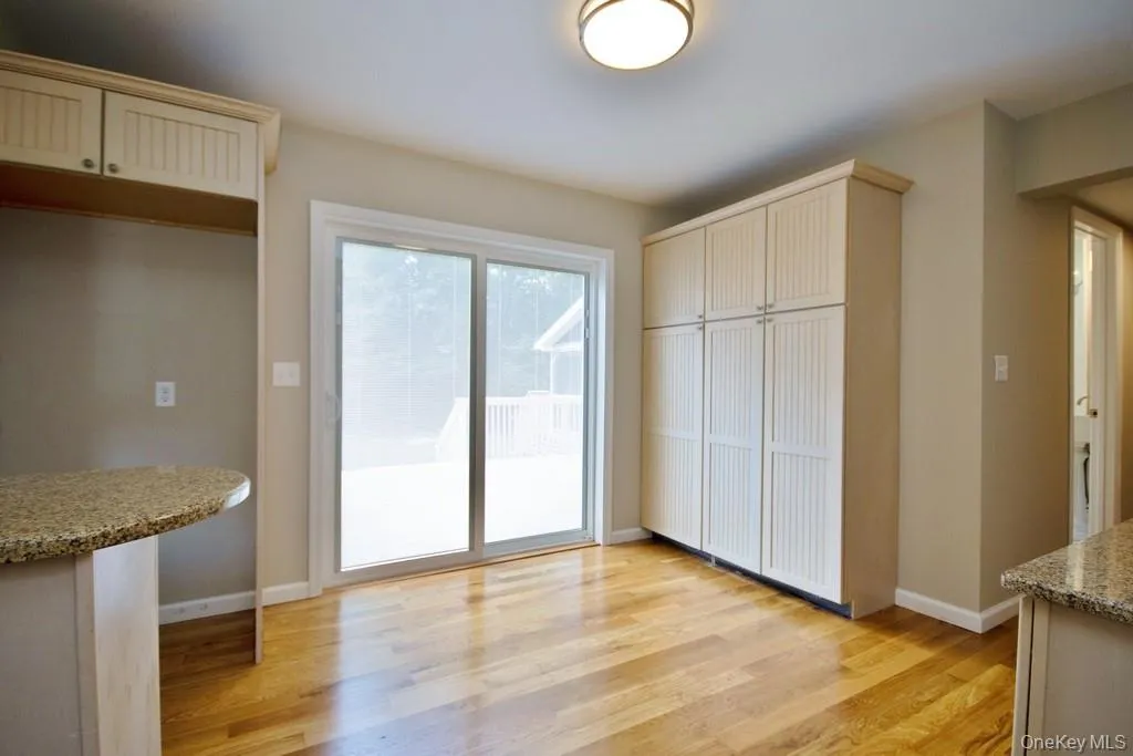 Unfurnished dining area with light wood finished floors Unfurnished dining area with light wood finished floors